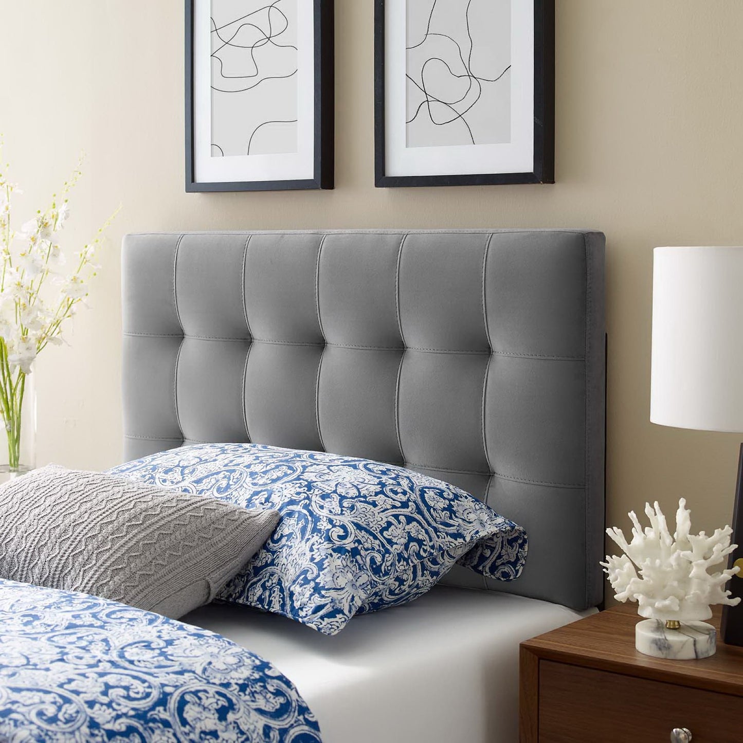 Grey tufted twin headboard.