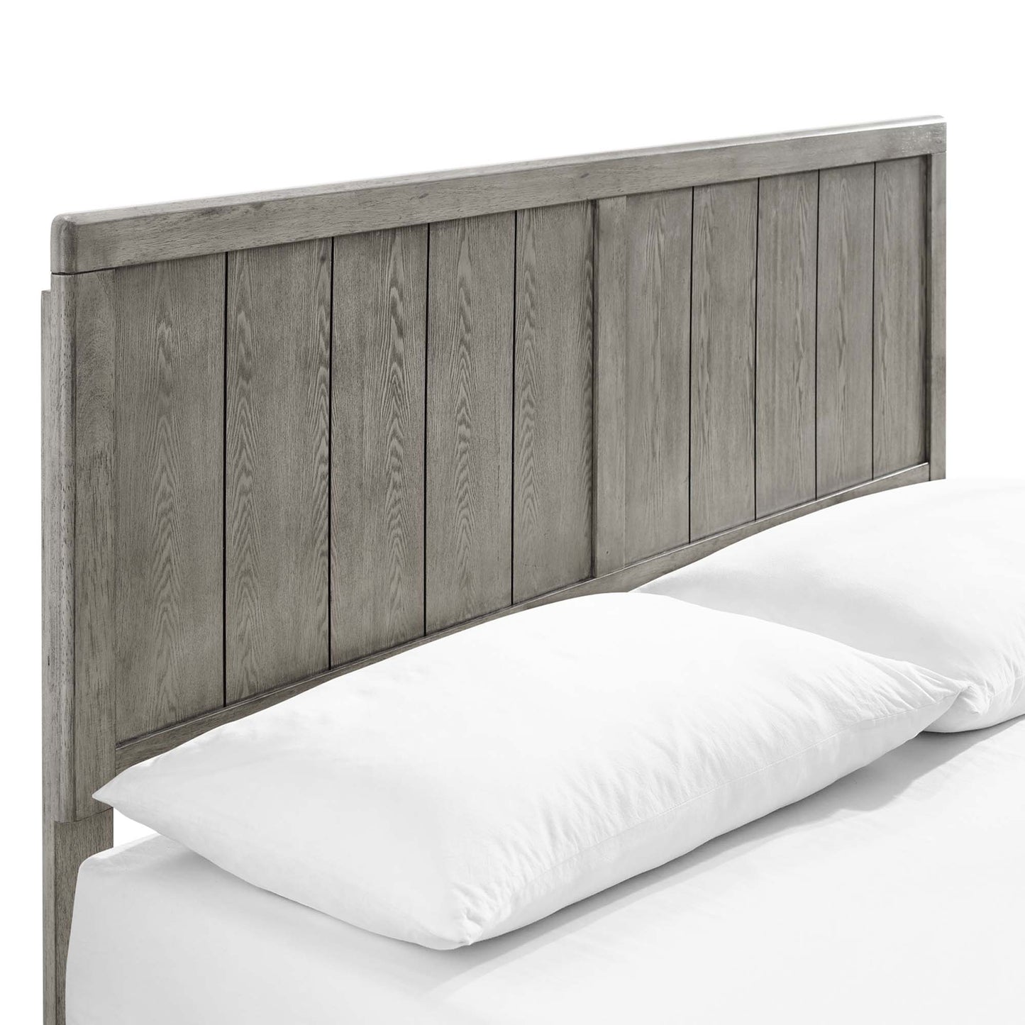 Weathered gray wood king platform bed with an angular, low-profile frame.