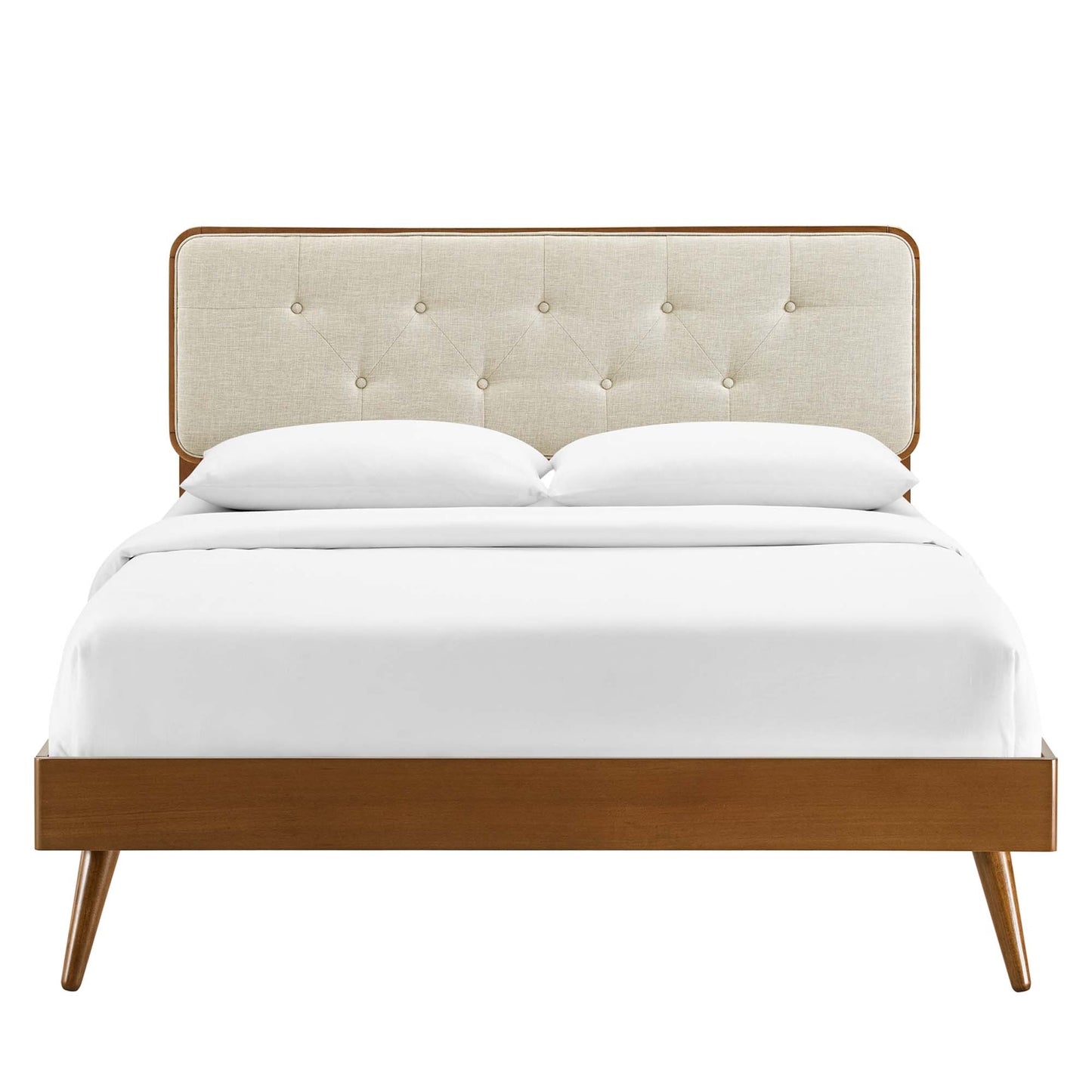 Walnut wood twin platform bed with splayed legs and white bedding.