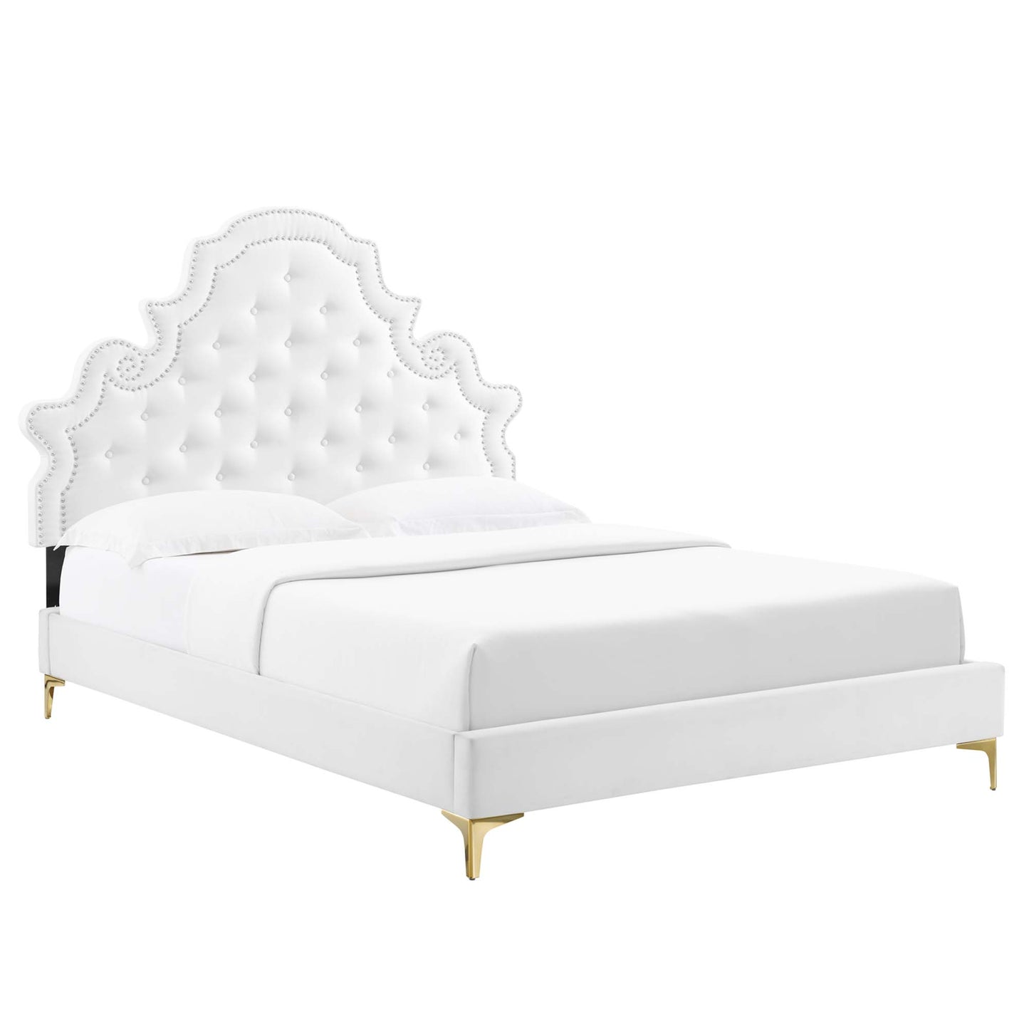 White tufted velvet twin platform bed with an ornate scalloped headboard, nailhead trim, and gold legs