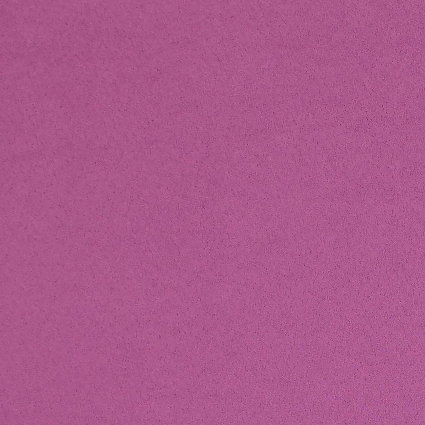 Close-up of purple faux suede fabric texture.