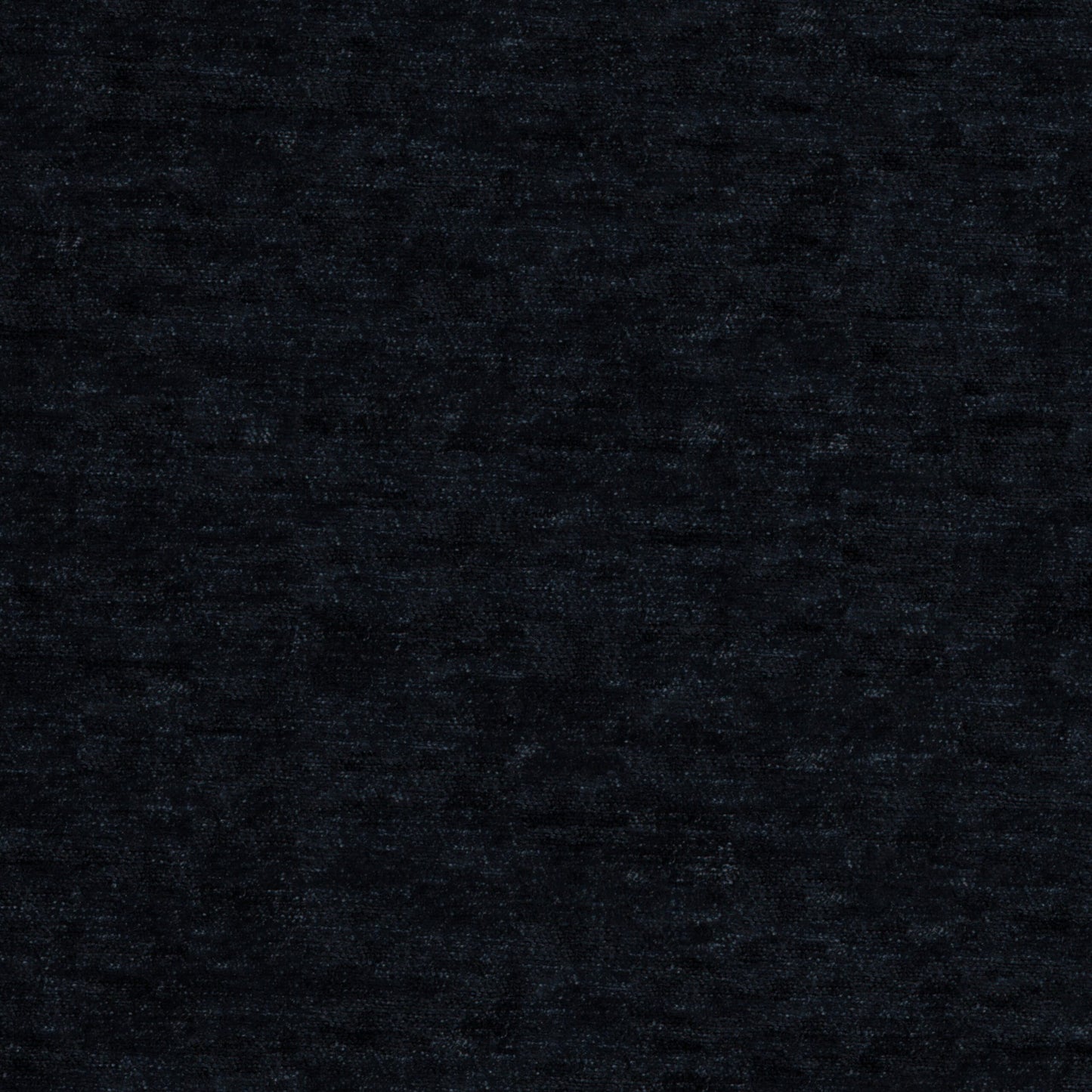 Plain black chenille fabric close-up with a soft, plush texture.