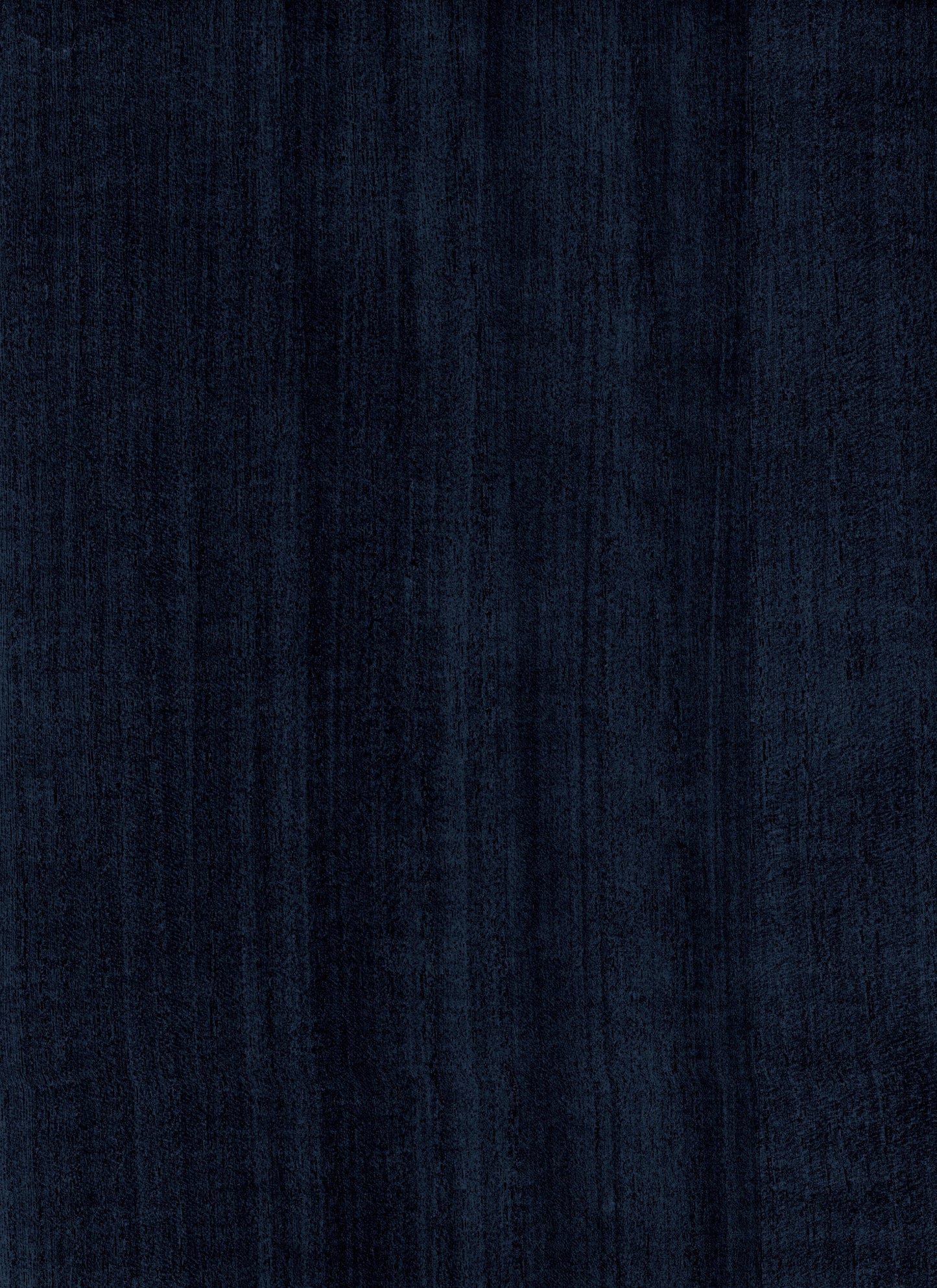 Dark navy velvet fabric texture with a soft plush nap; ideal for upholstery or fashion.