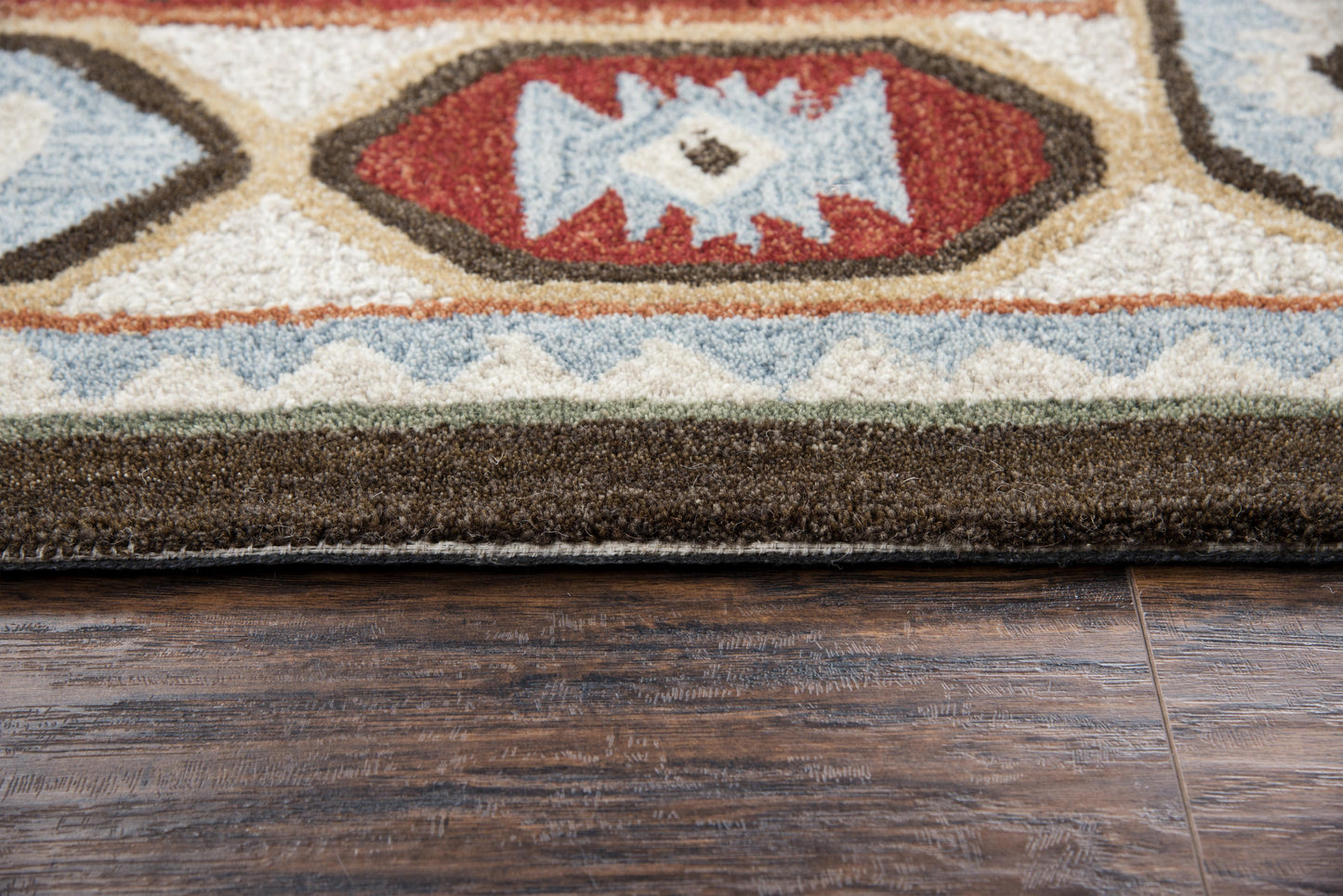 5' x 8' rug in rustic lodge style.