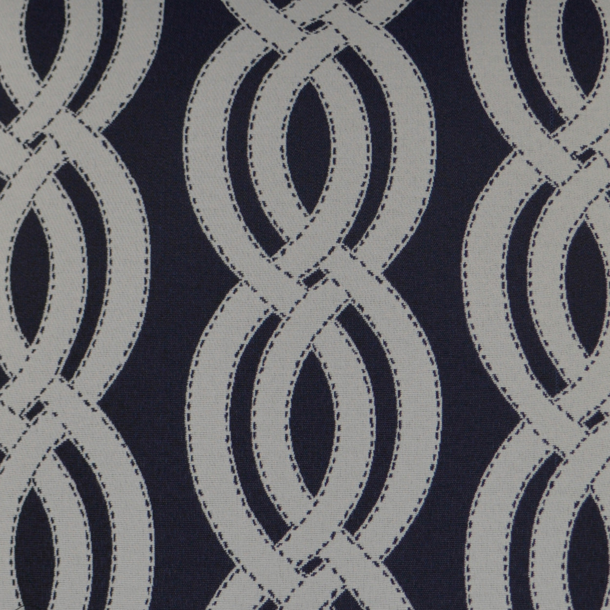Navy outdoor lumbar pillow with pale gray rope motif.