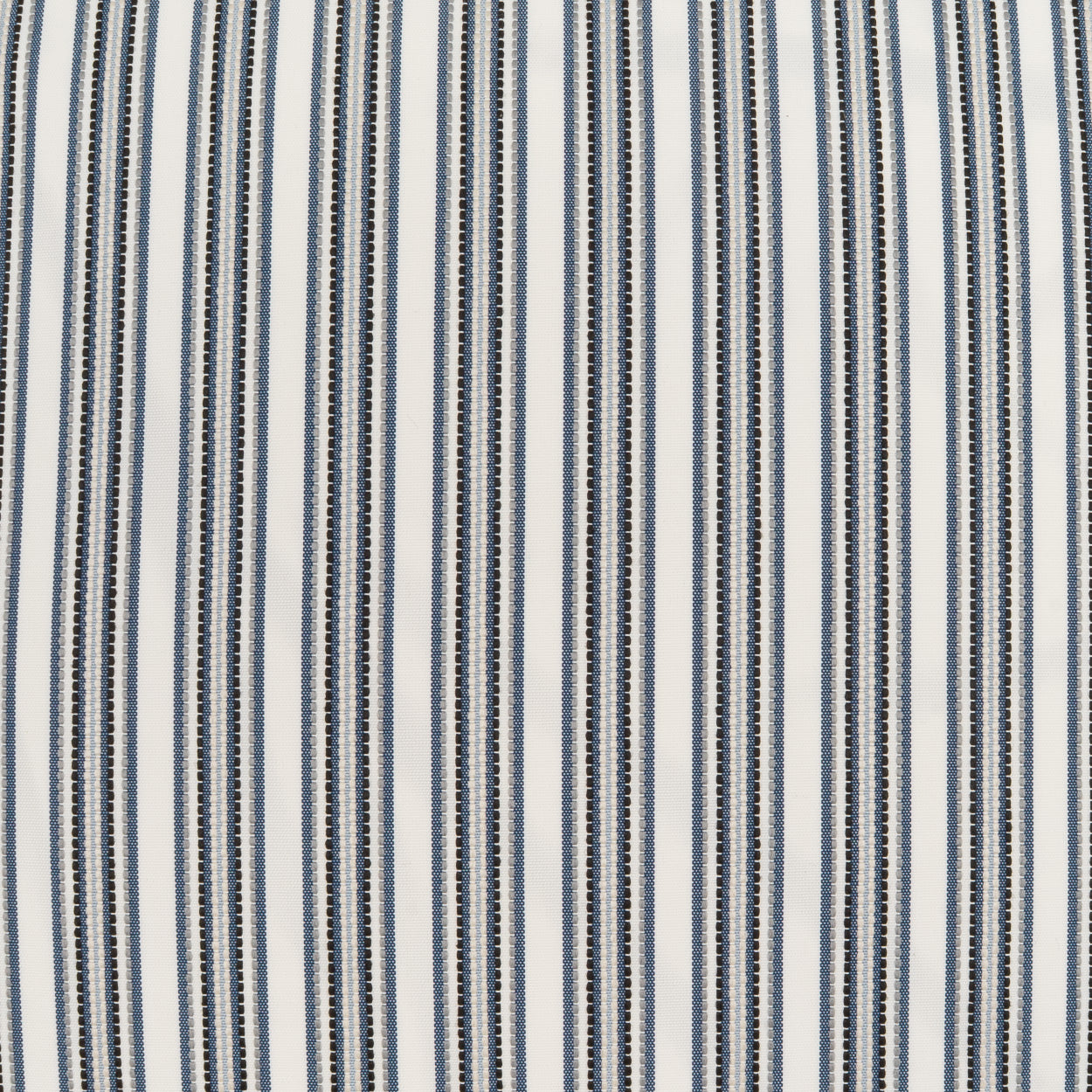 Navy blue and white striped fabric with narrow dotted navy stripes; versatile textile for apparel or upholstery.