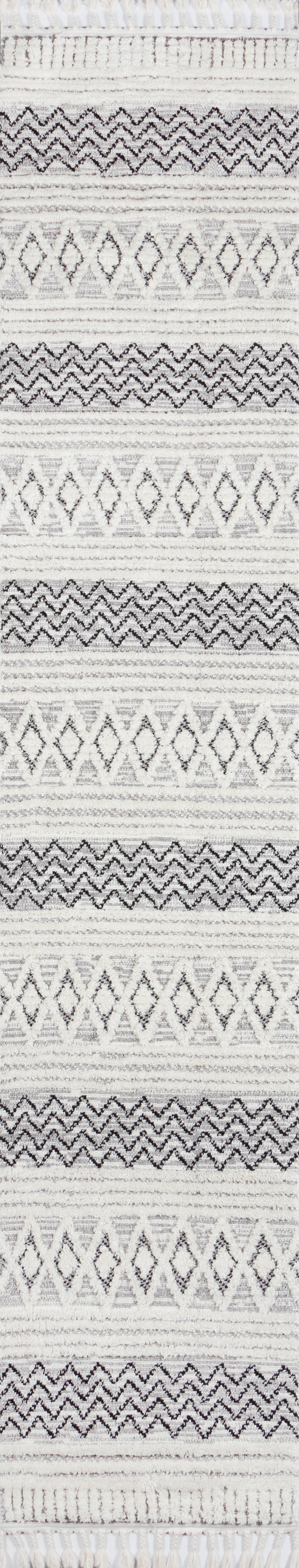 Light gray and ivory geometric area rug with diamond and chevron patterns, woven texture, fringe trim.