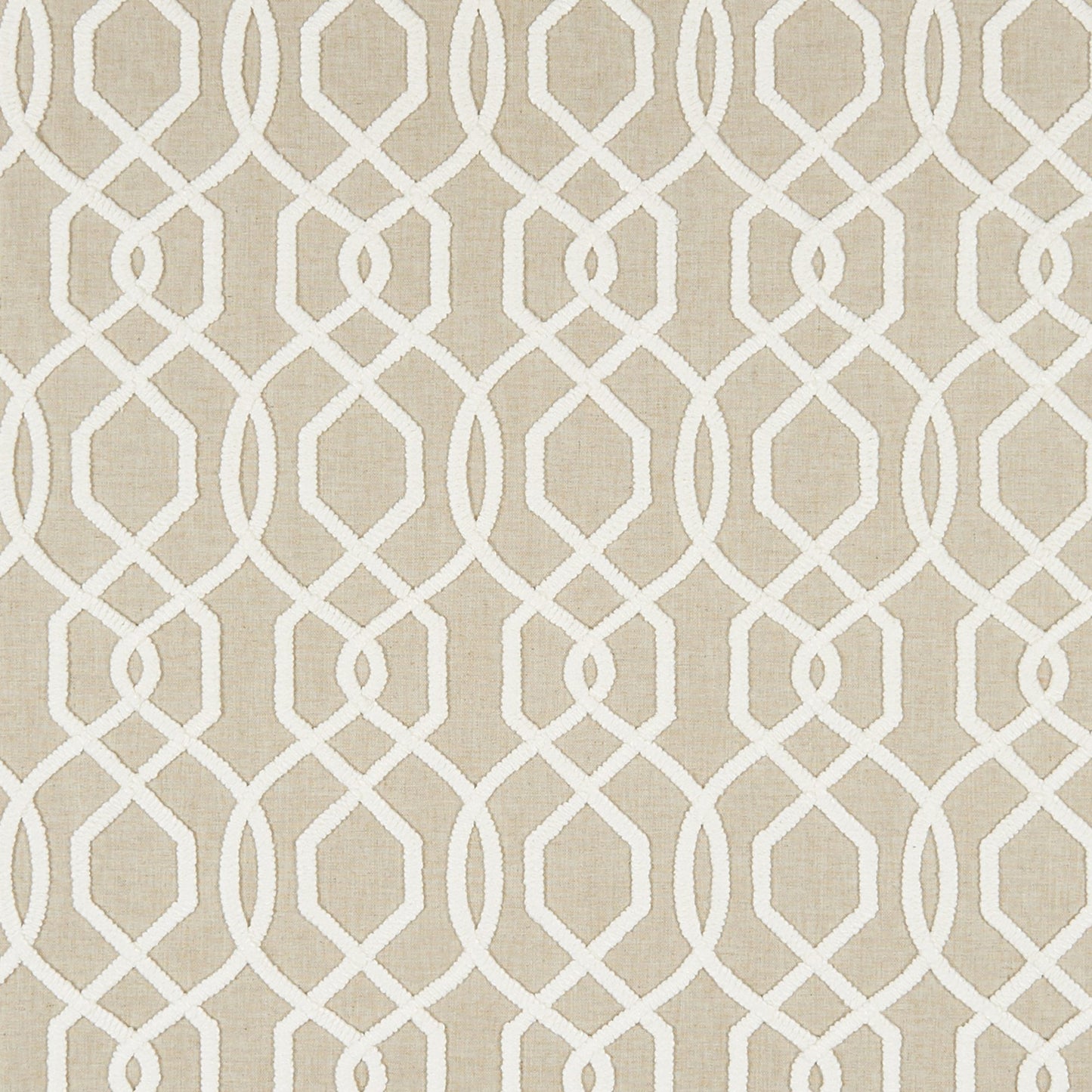 Beige fabric with white interlocking loop lattice pattern; geometric, modern decorative textile.