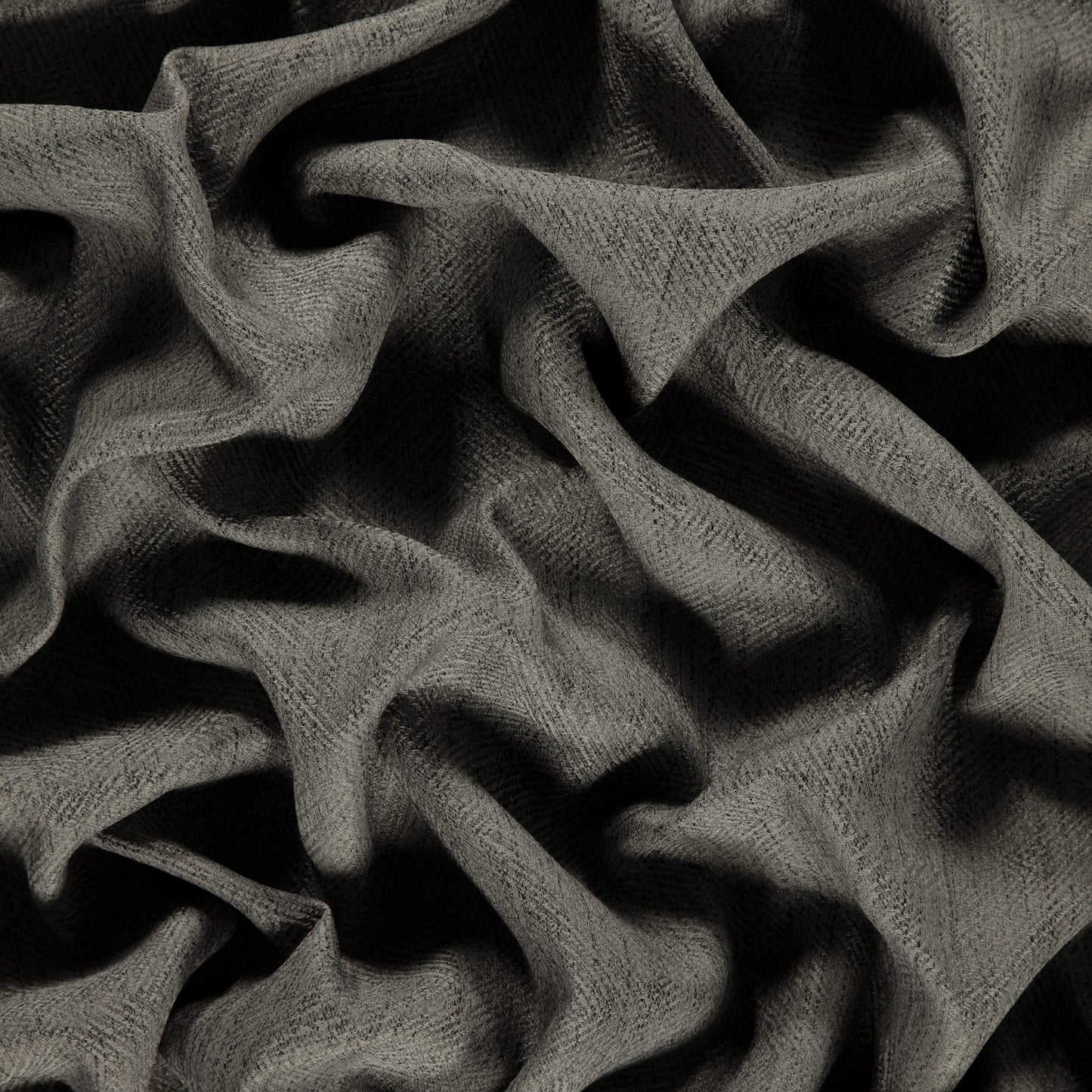 Charcoal gray woven jacquard dimout fabric with soft folds and a textured surface.