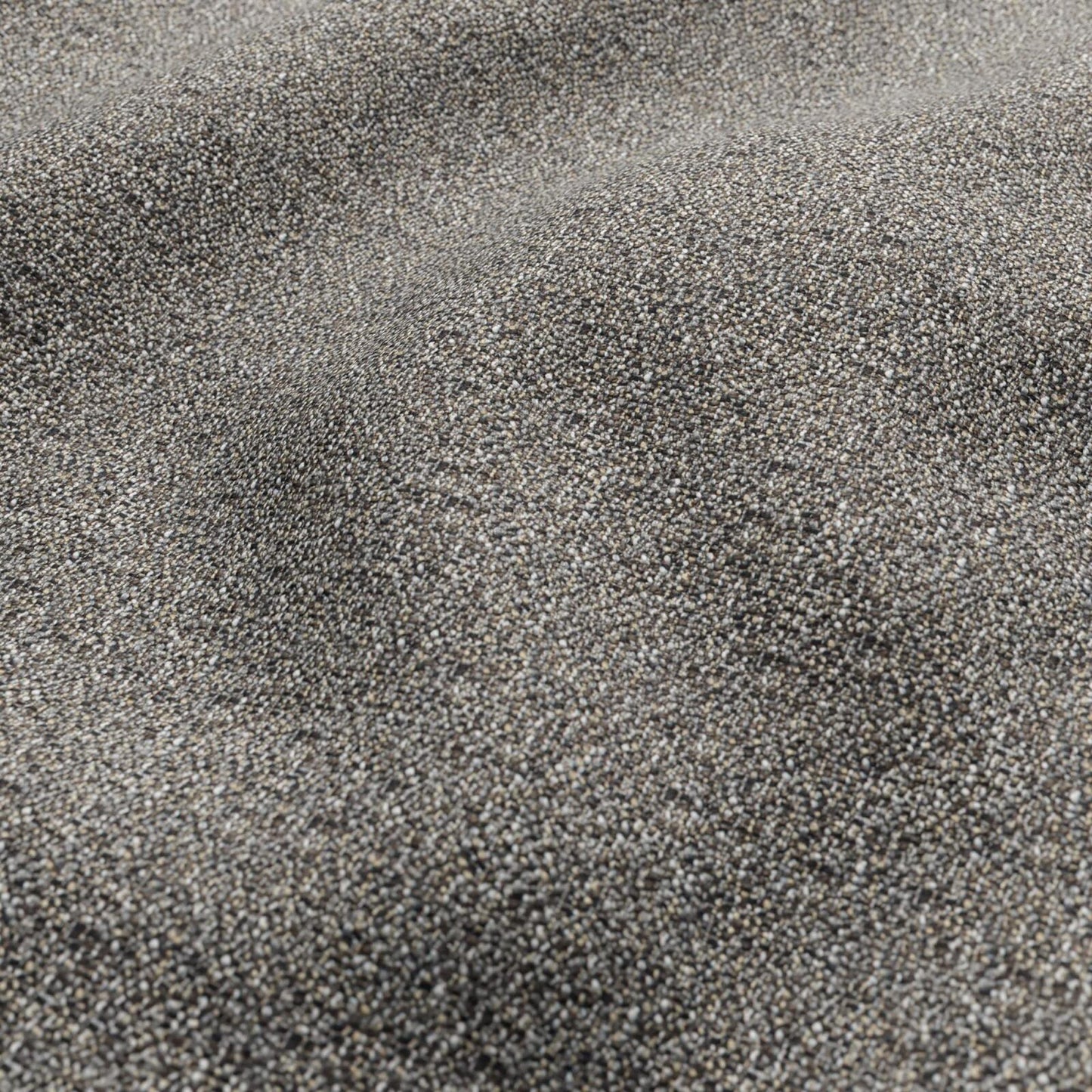 Close-up of gray-beige speckled boucle fabric with a fine woven texture.