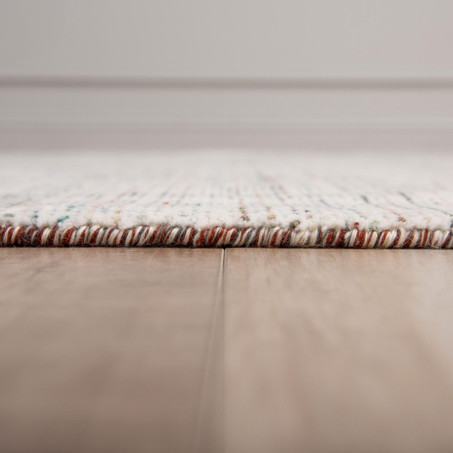 Rectangular area rug with a transitional pattern, 9' x 12'.