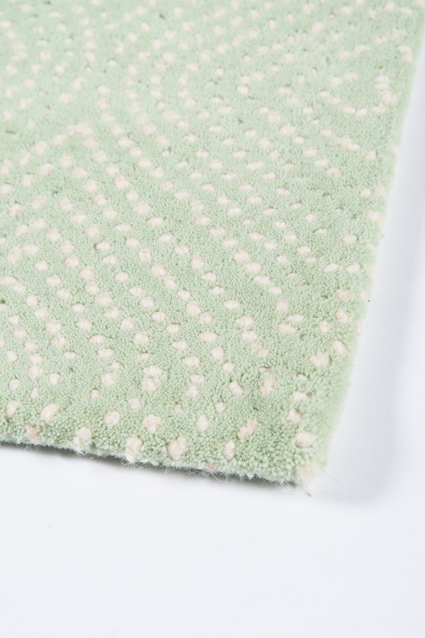 Mint green plush runner rug (2' x 8') with a white raised dot pattern and soft microfiber texture.
