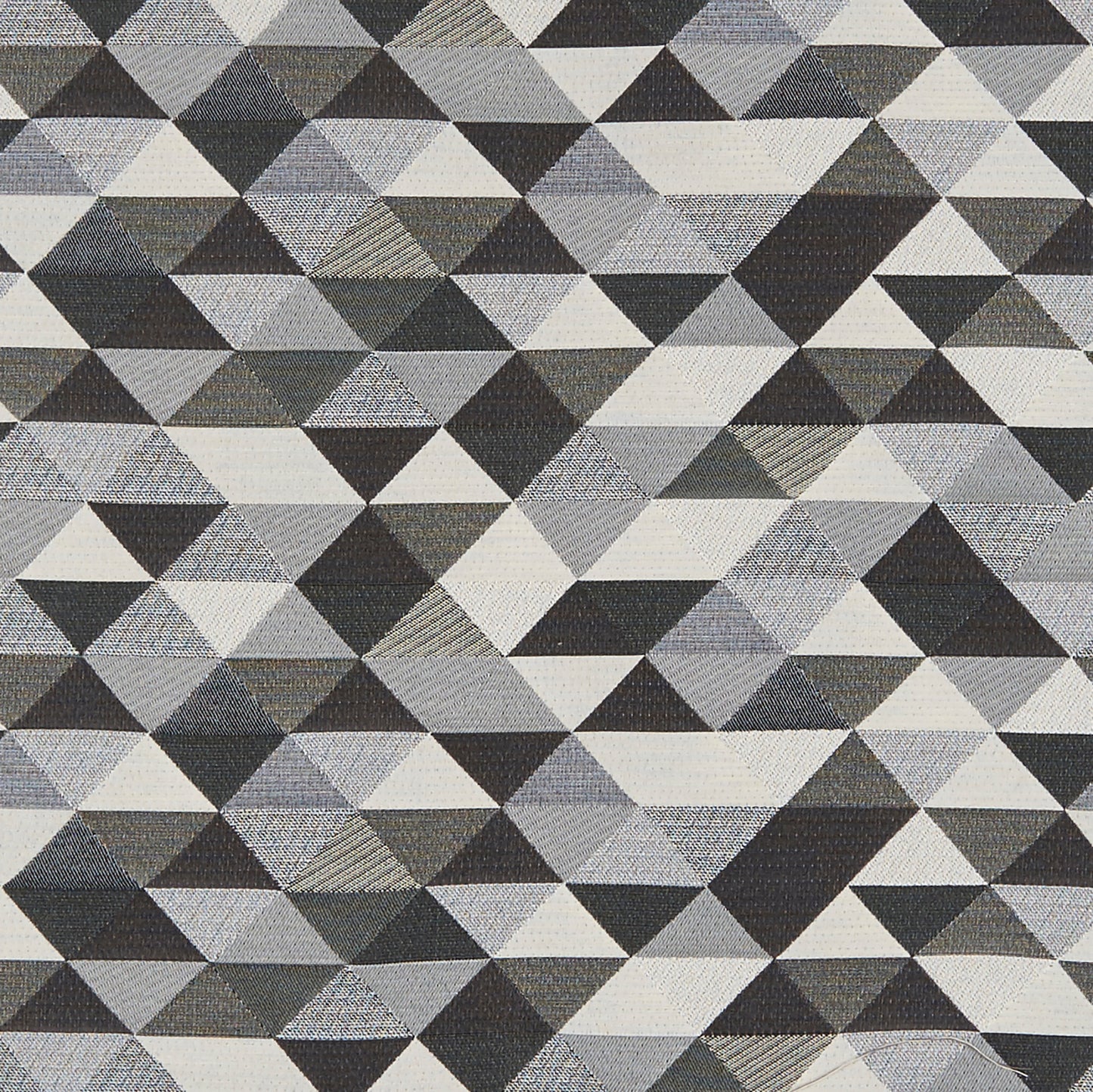 Gray, charcoal, and white woven Jacquard fabric with a repeating tessellated triangle geometric pattern.