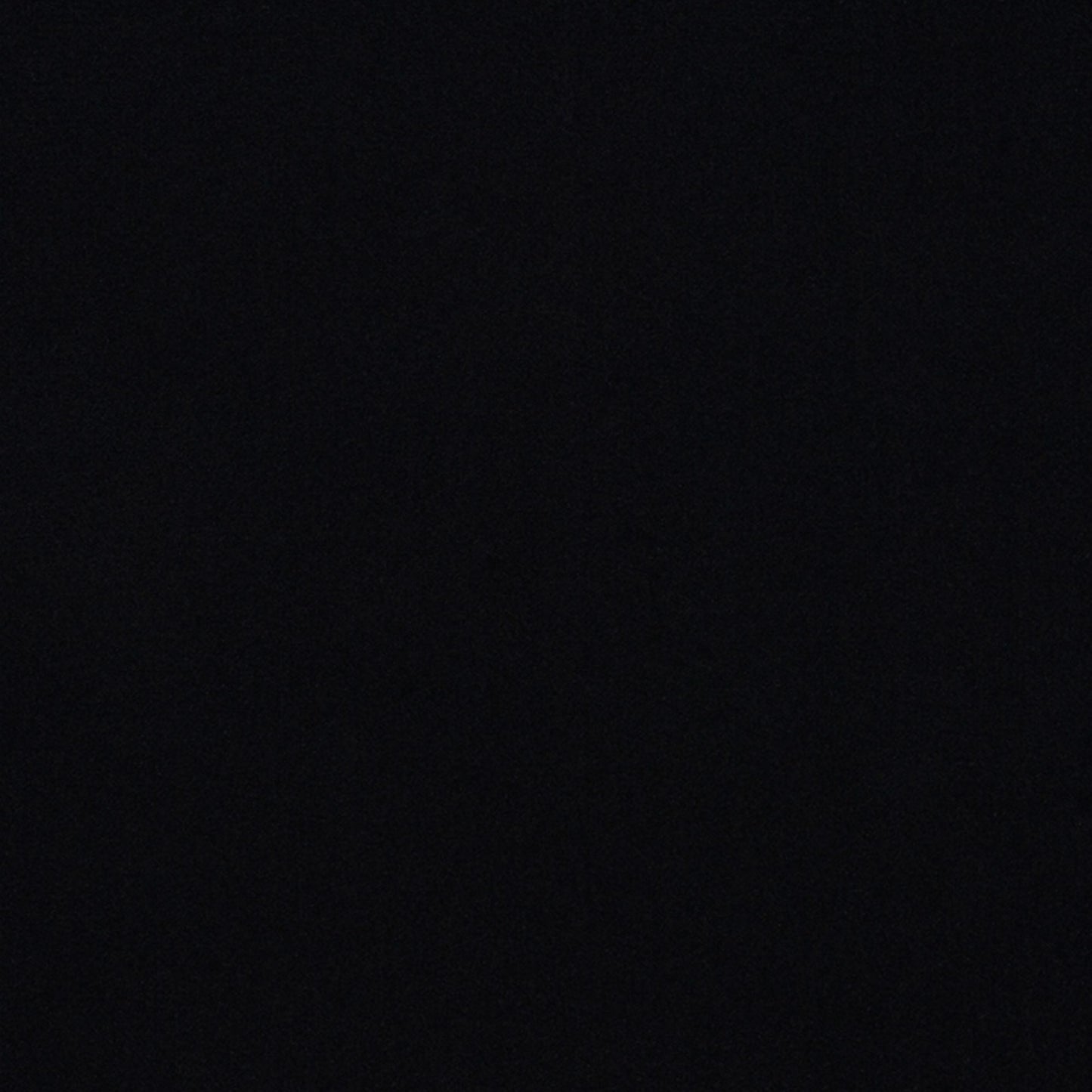 Solid black velvet fabric swatch with a plush texture.