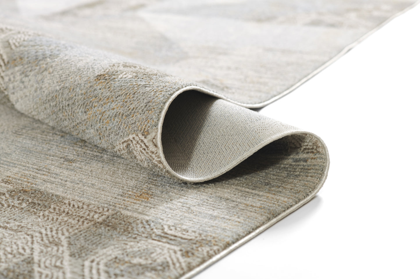 Light gray and beige patterned woven rug, rolled corner, geometric design, soft pile for living room decor.