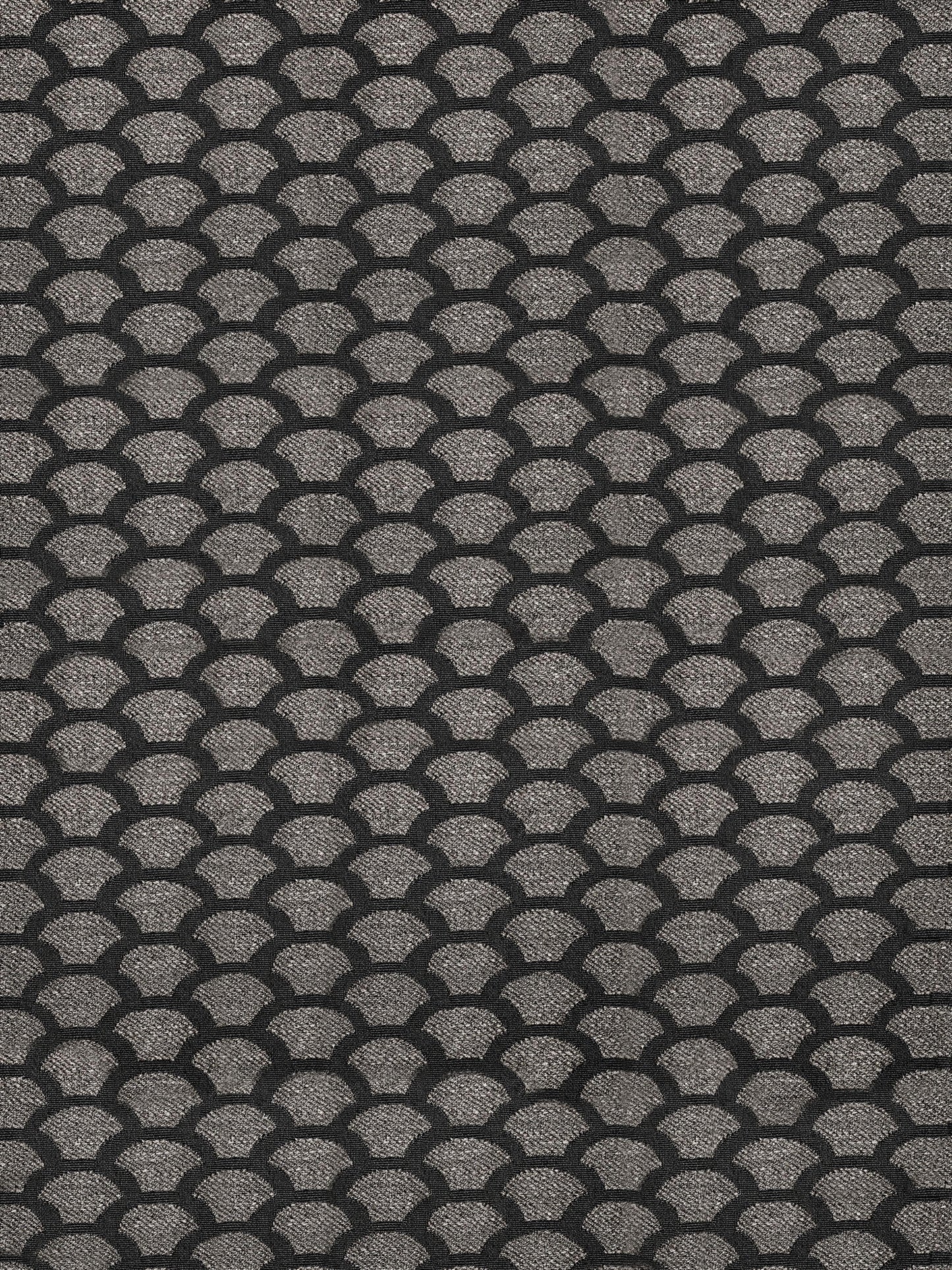 Grey fabric with repeating black scallop pattern and subtle textured weave, suitable for upholstery or fashion.