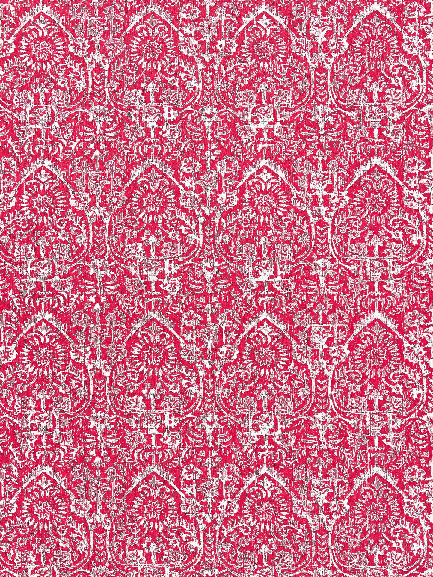 Red hibiscus-patterned sarong fabric with white floral design.