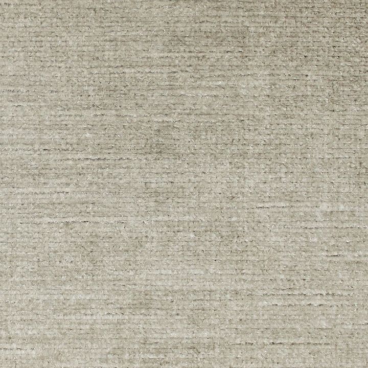Beige textured rug close-up with subtle horizontal ribbing in cream-taupe tones.