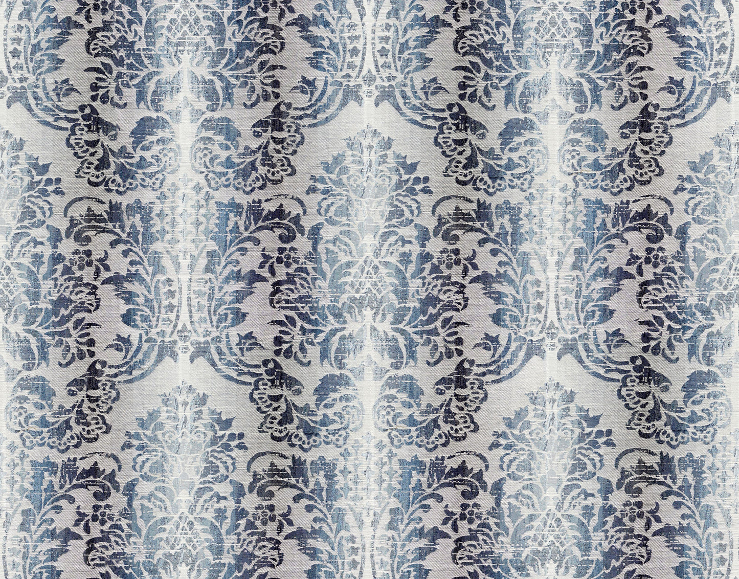 Blue damask pattern with ornate floral scrolls on light ivory background; elegant wallpaper or upholstery fabric.
