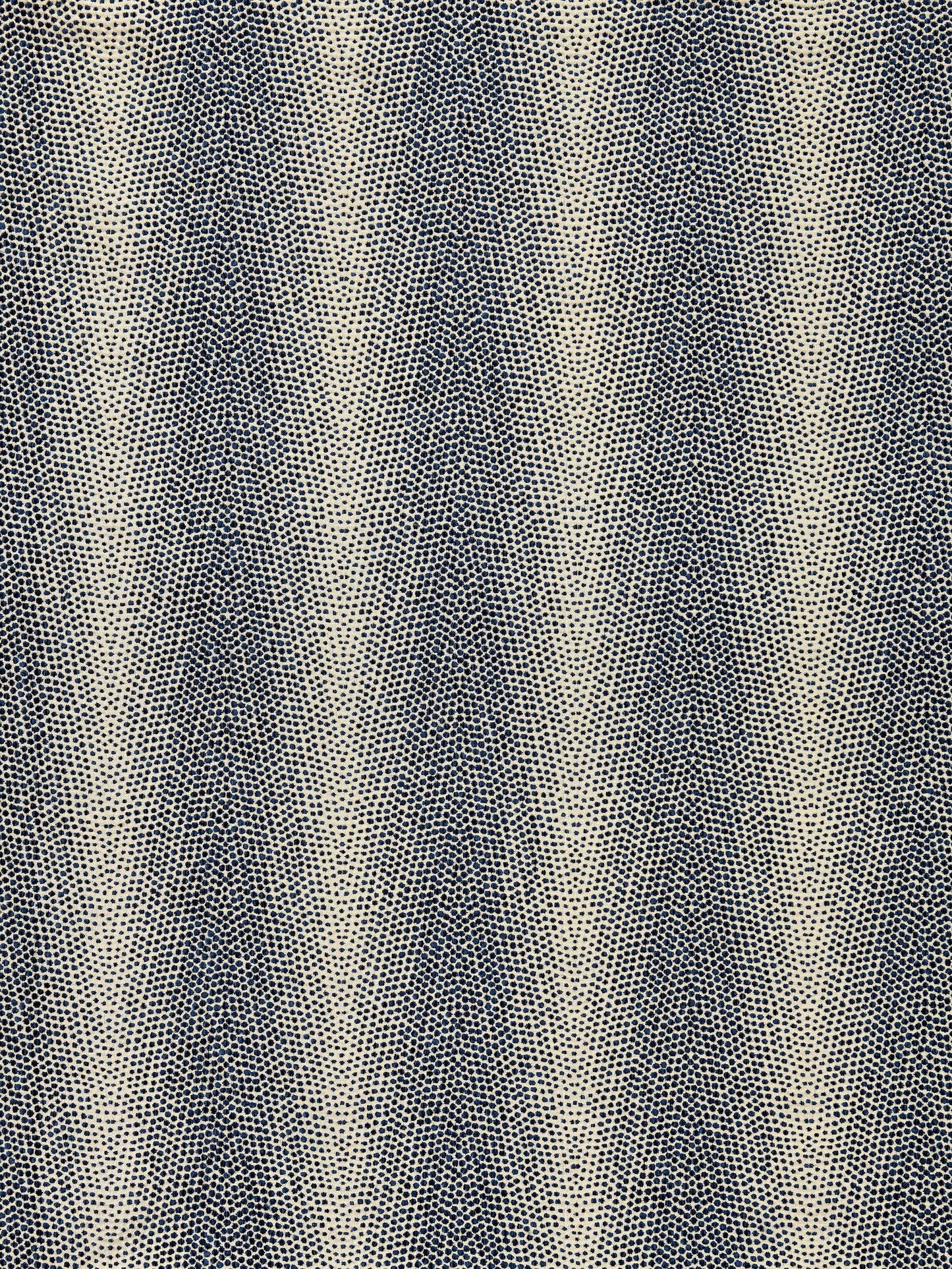 Indigo weave fabric with a textured dotted pattern and subtle vertical stripes.