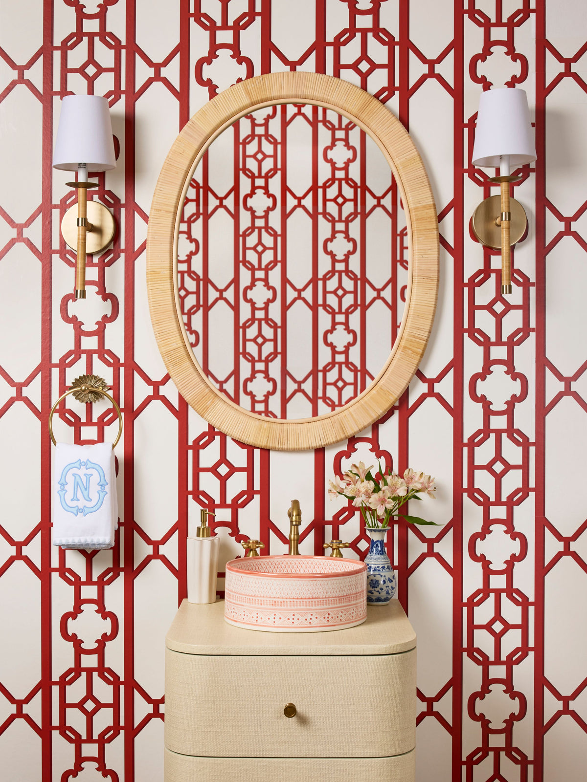 Red lacquer fretwork furniture piece with lattice design and glossy finish.