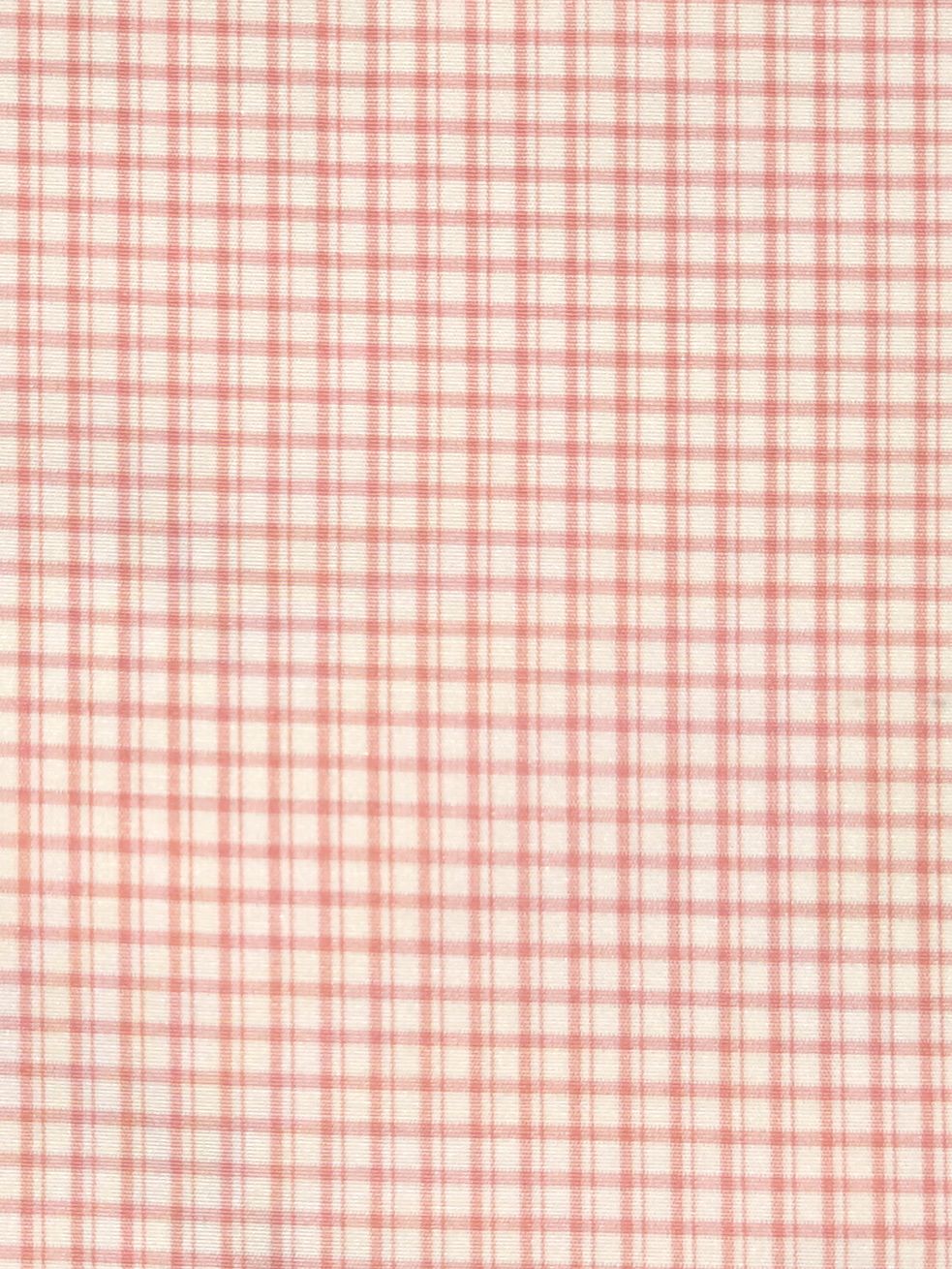 Cream fabric with pink gingham checks; small square grid in pastel tones.