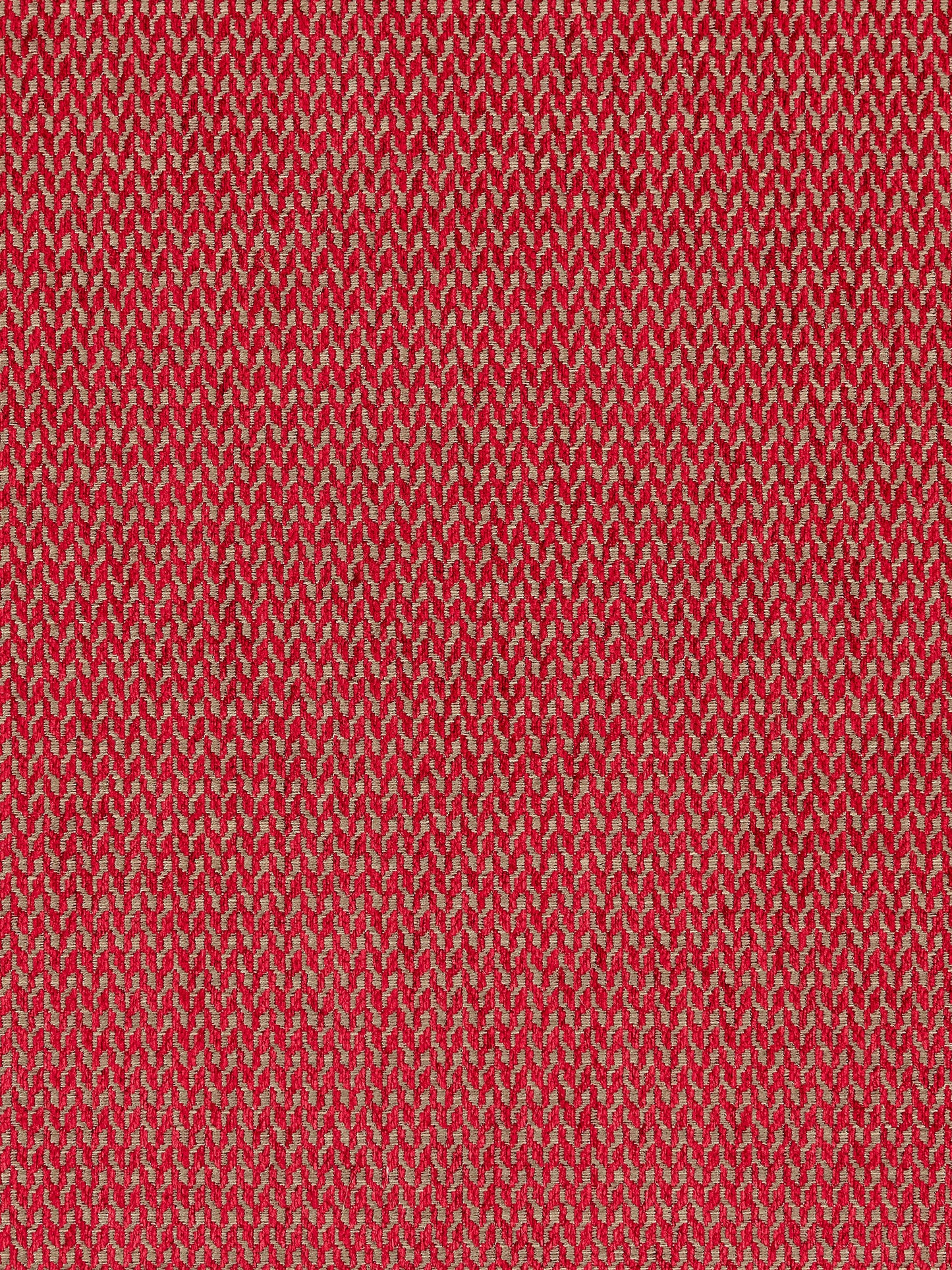 Red heather knit fabric with a tiny V-shaped pattern in beige on red, soft textured textile.