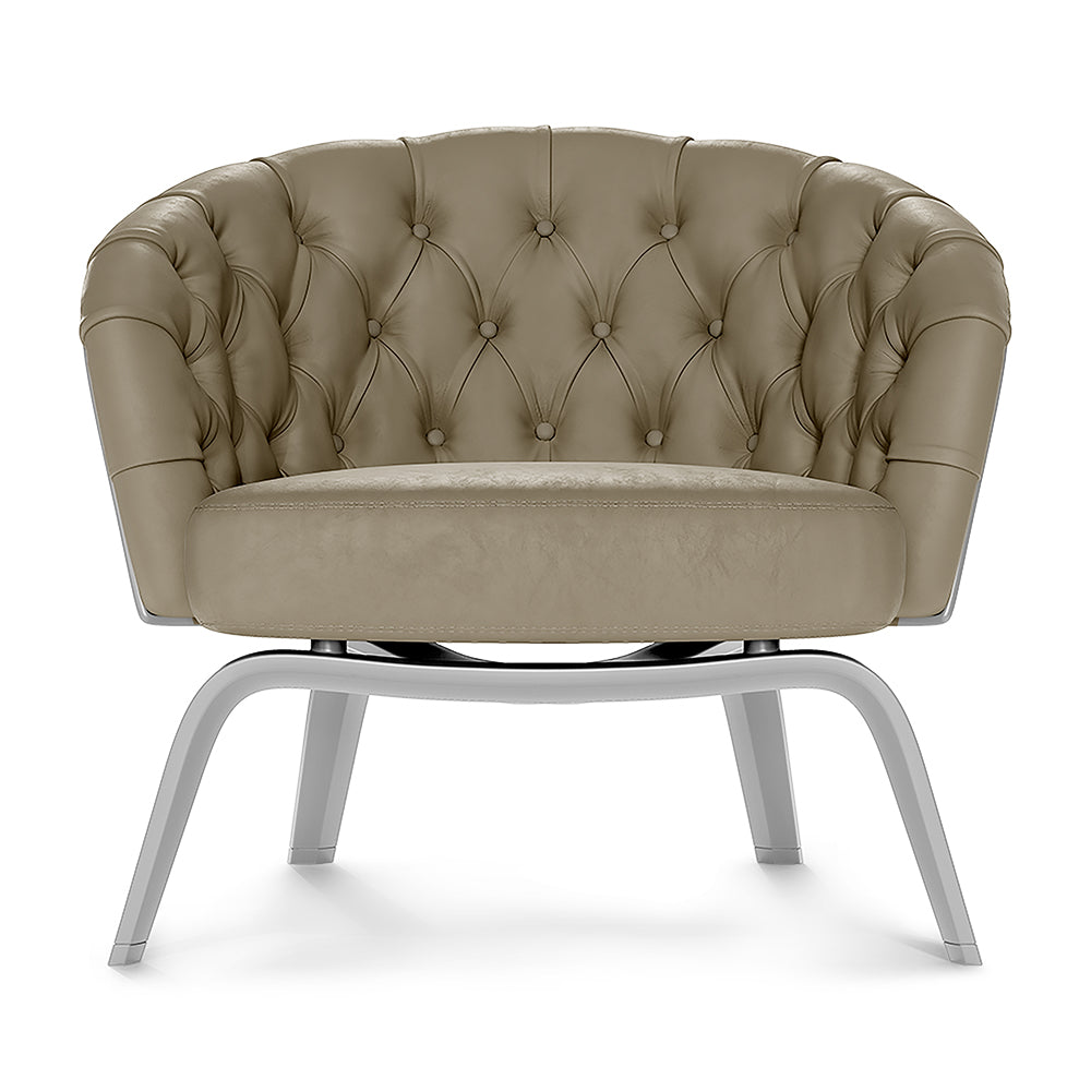 Taupe solid fabric upholstered barrel chair with button-tufted back and curved chrome legs.