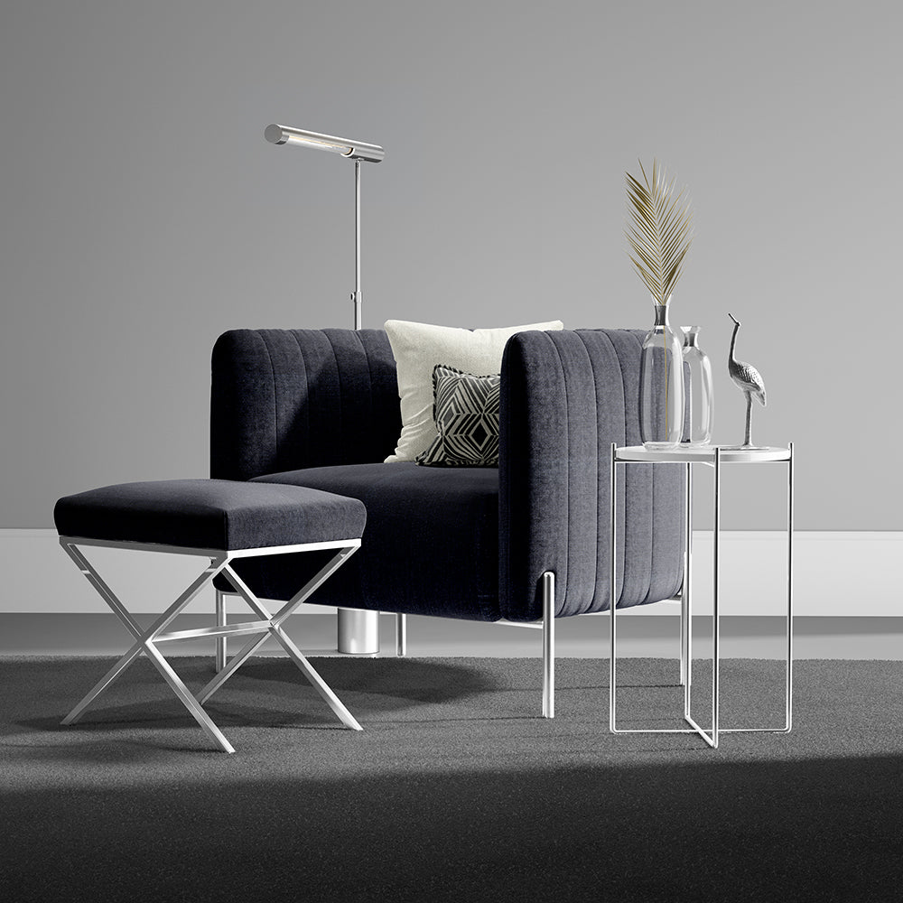 Midnight solid upholstery fabric swatch in charcoal, shown in a lifestyle image with a modern living room and decor.
