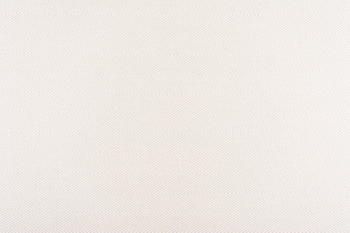 Beige textured fabric with a subtle chevron-herringbone pattern.