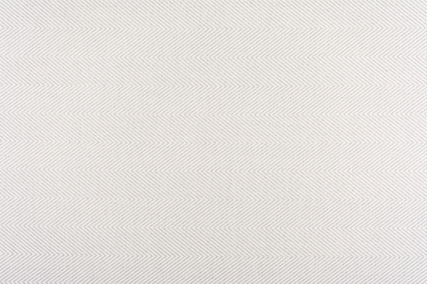 Light gray herringbone fabric texture with subtle chevrons.