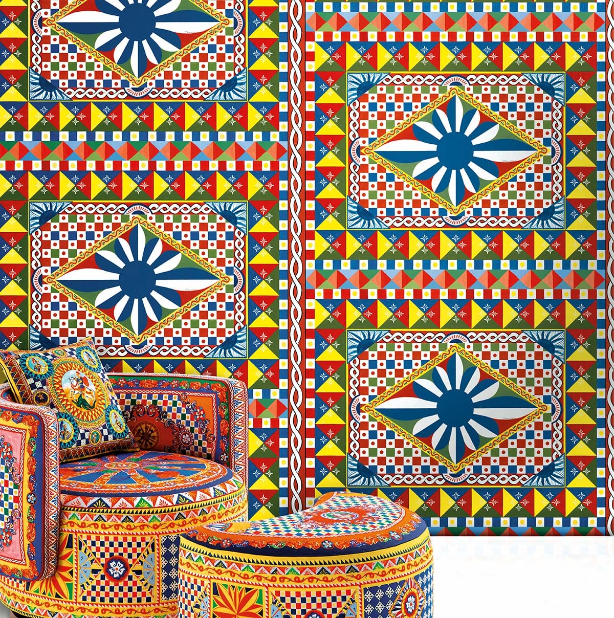 Boho quilted wall tapestry in blue sunburst diamonds with red-yellow-green borders; matching cushions and ottoman.