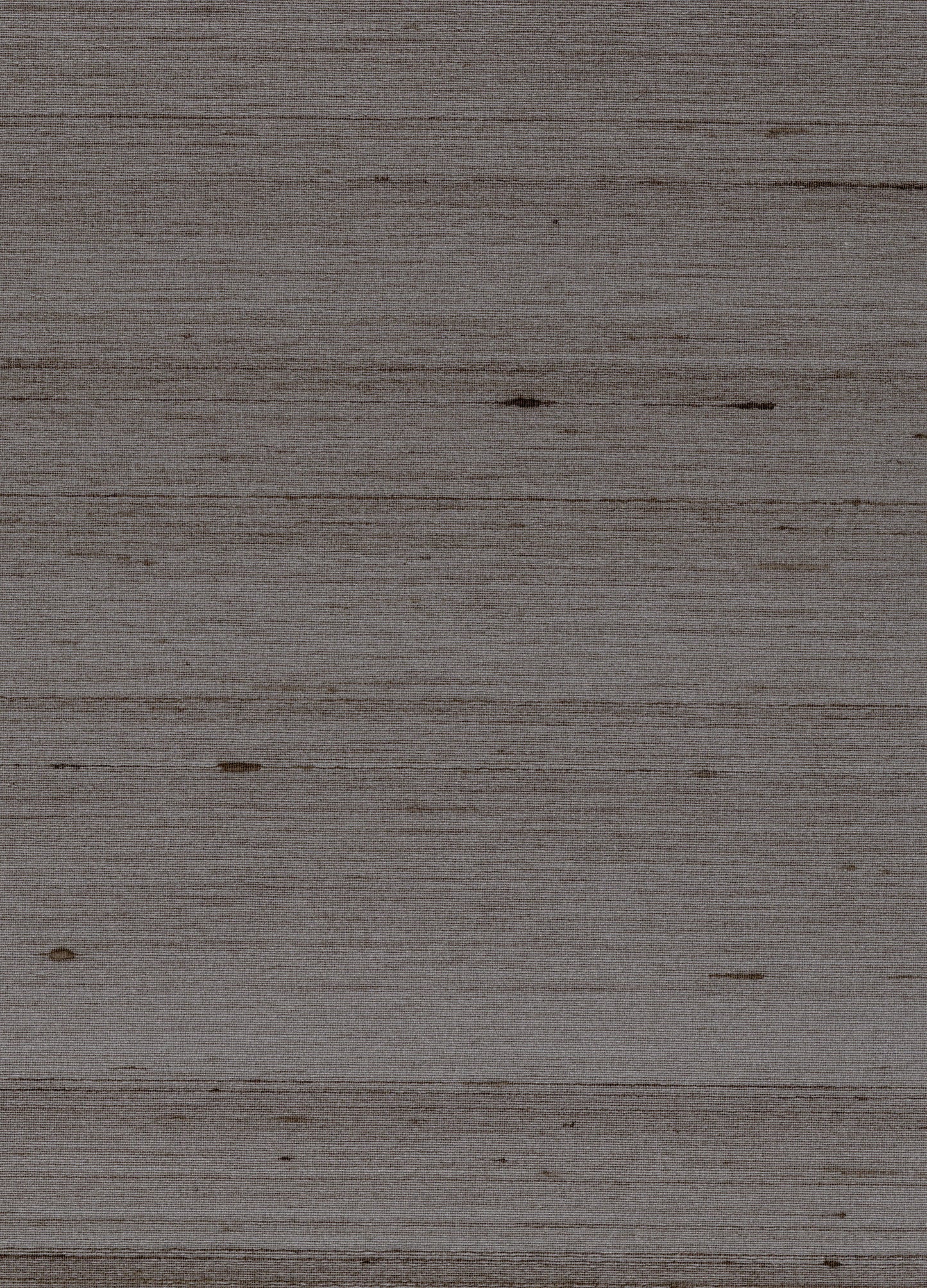 Weathered gray-brown wooden plank surface with subtle horizontal grain and small knots.