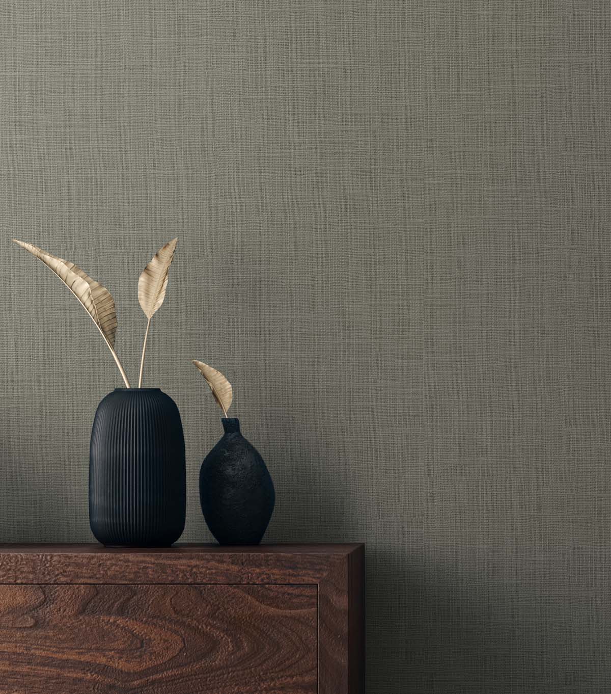 Grey matte linen textile on a wooden surface.