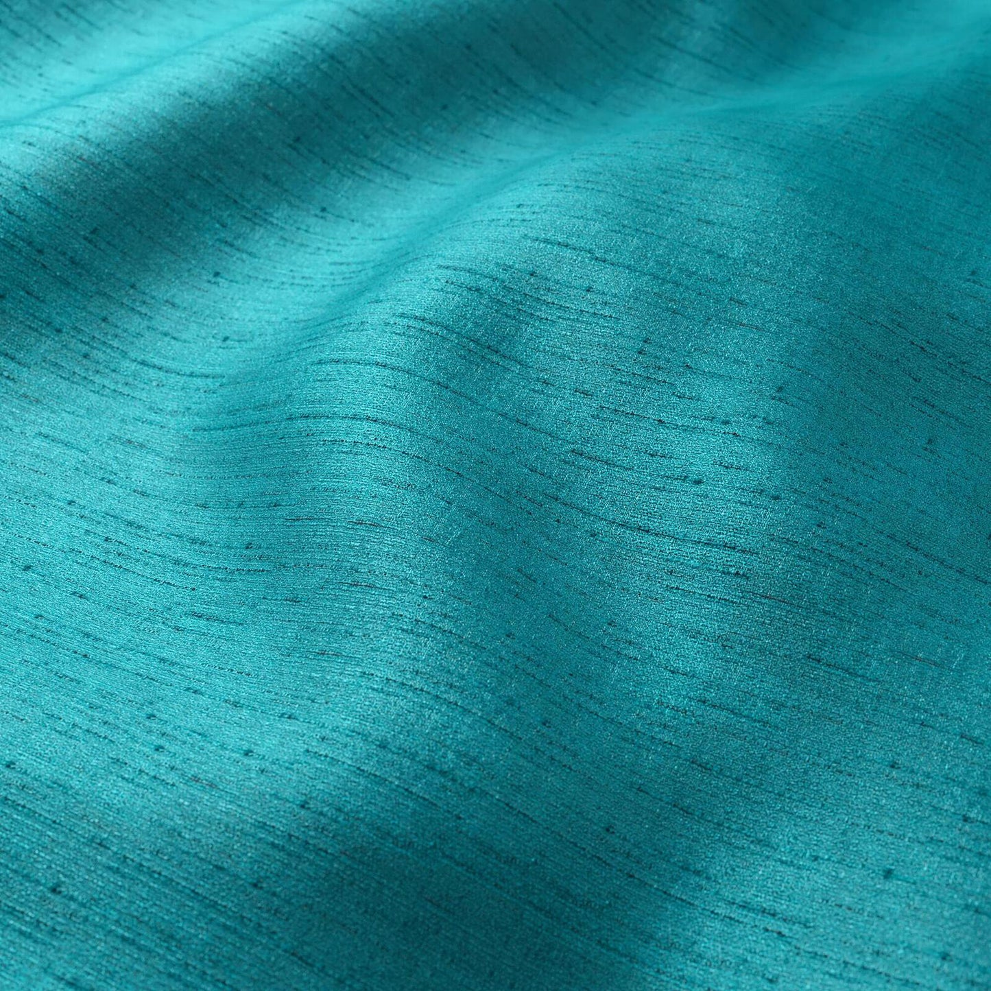 Teal turquoise fabric with subtle horizontal grain and soft sheen, draped texture for scarves or dresses.