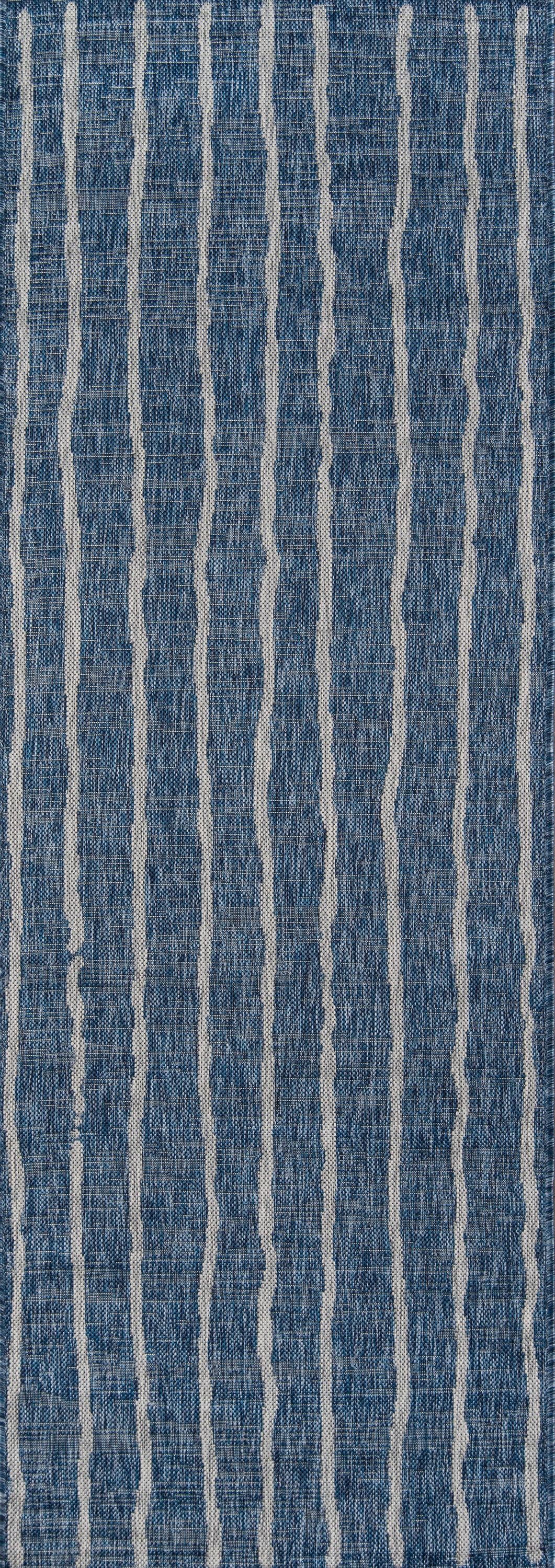 Blue denim-style fabric with white vertical pinstripes and a textured weave.