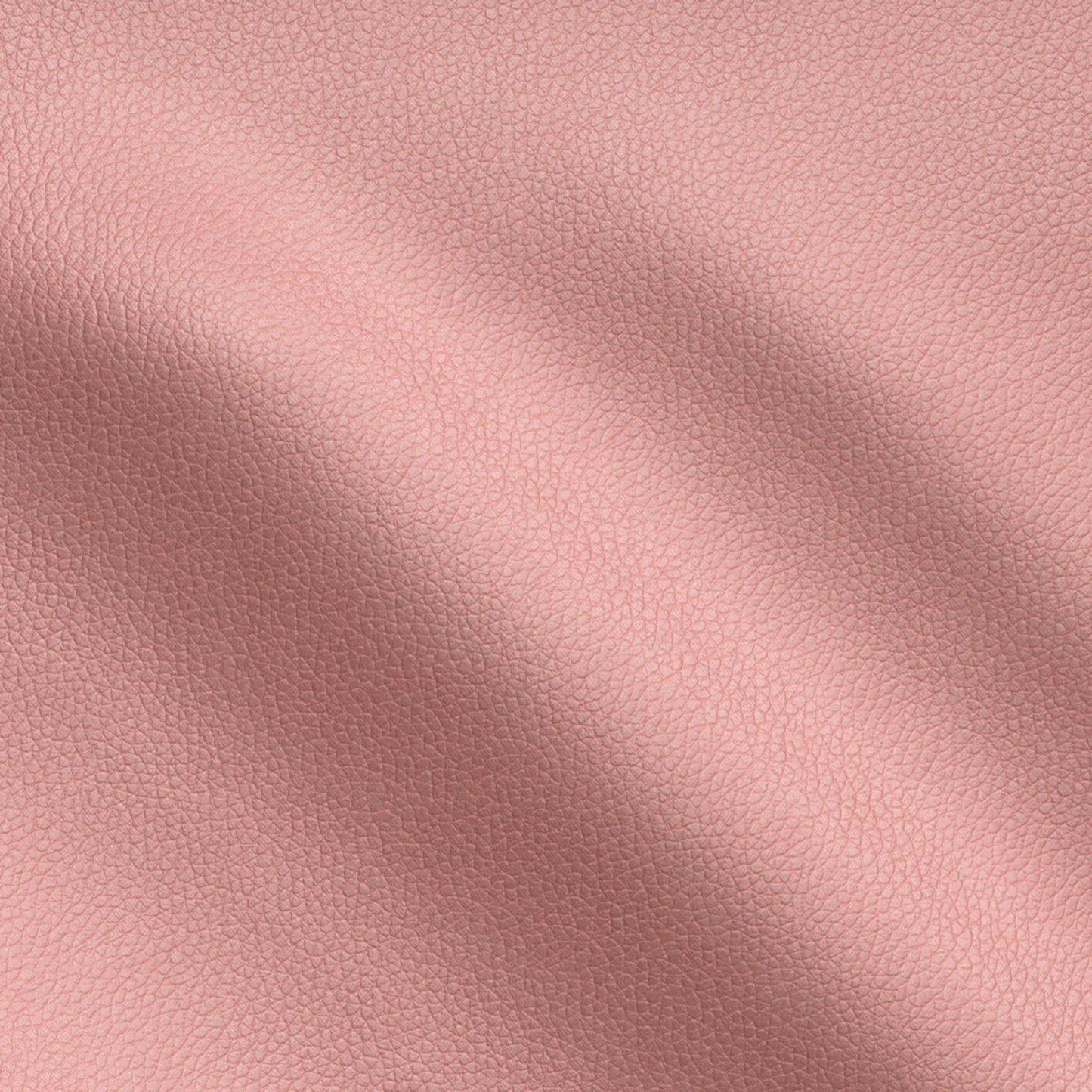 Peach pink vegan leather texture with fine grain and soft, draped folds.