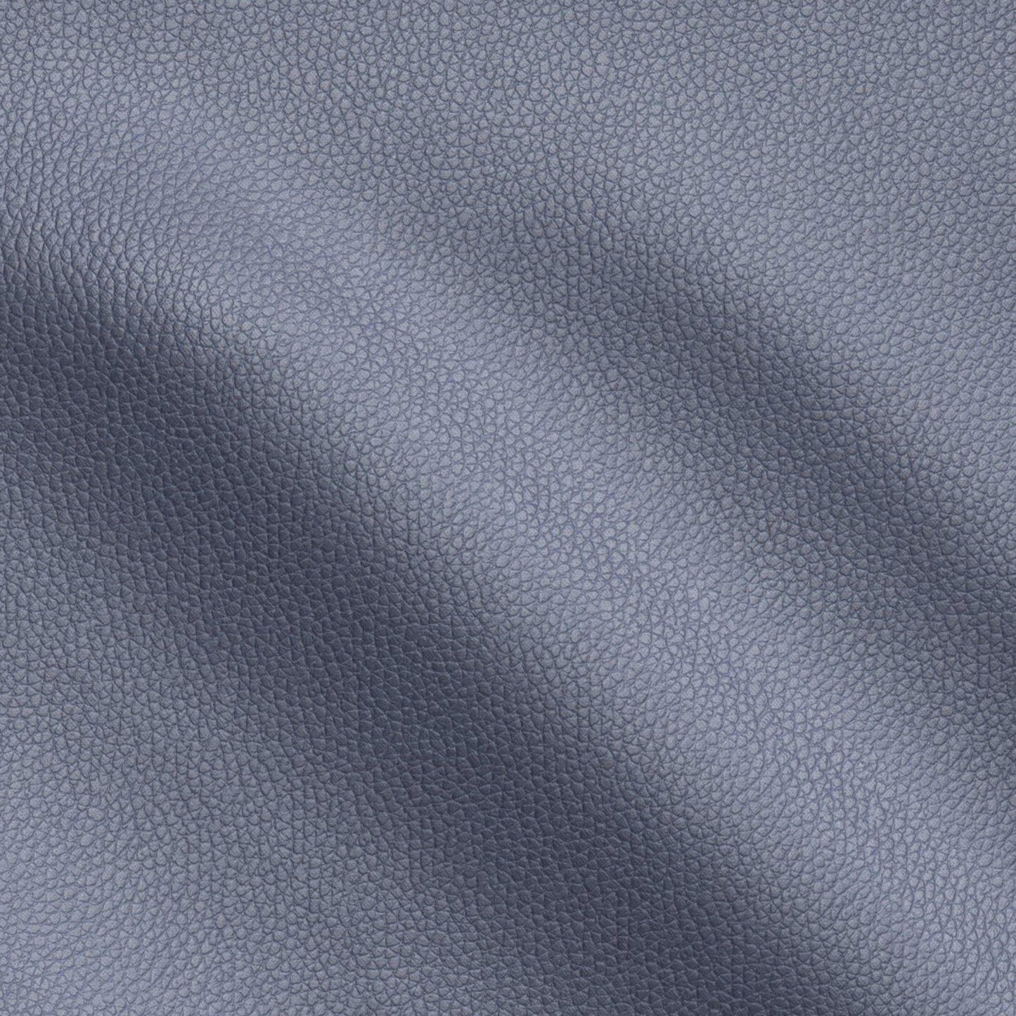 Navy blue pebbled fabric with a leather-like texture, showing gentle creases and soft shading.
