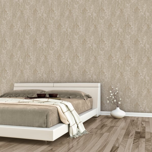 Gold metallic damask wallpaper with a modern pattern on the wall.