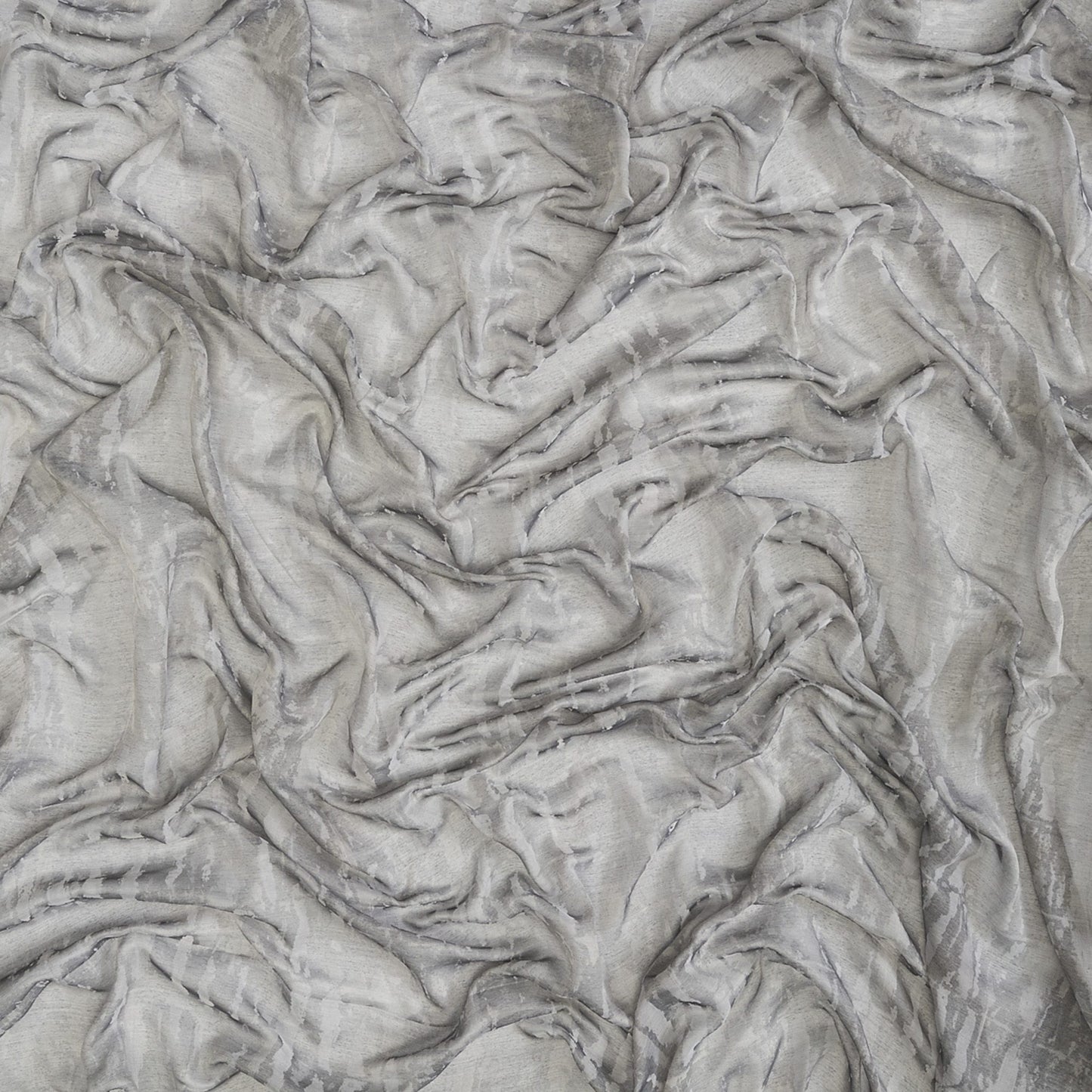 Sheer fabric in abstract grey and taupe tones, plain color, wide width.