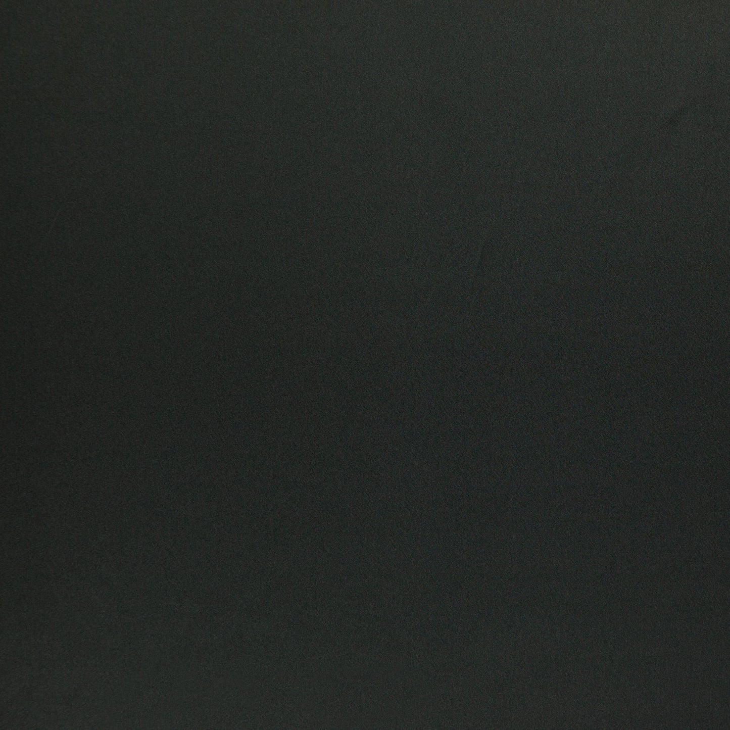 Charcoal black fabric texture with subtle grain; slight satin-like sheen typical of sateen, suitable for upholstery or crafts.