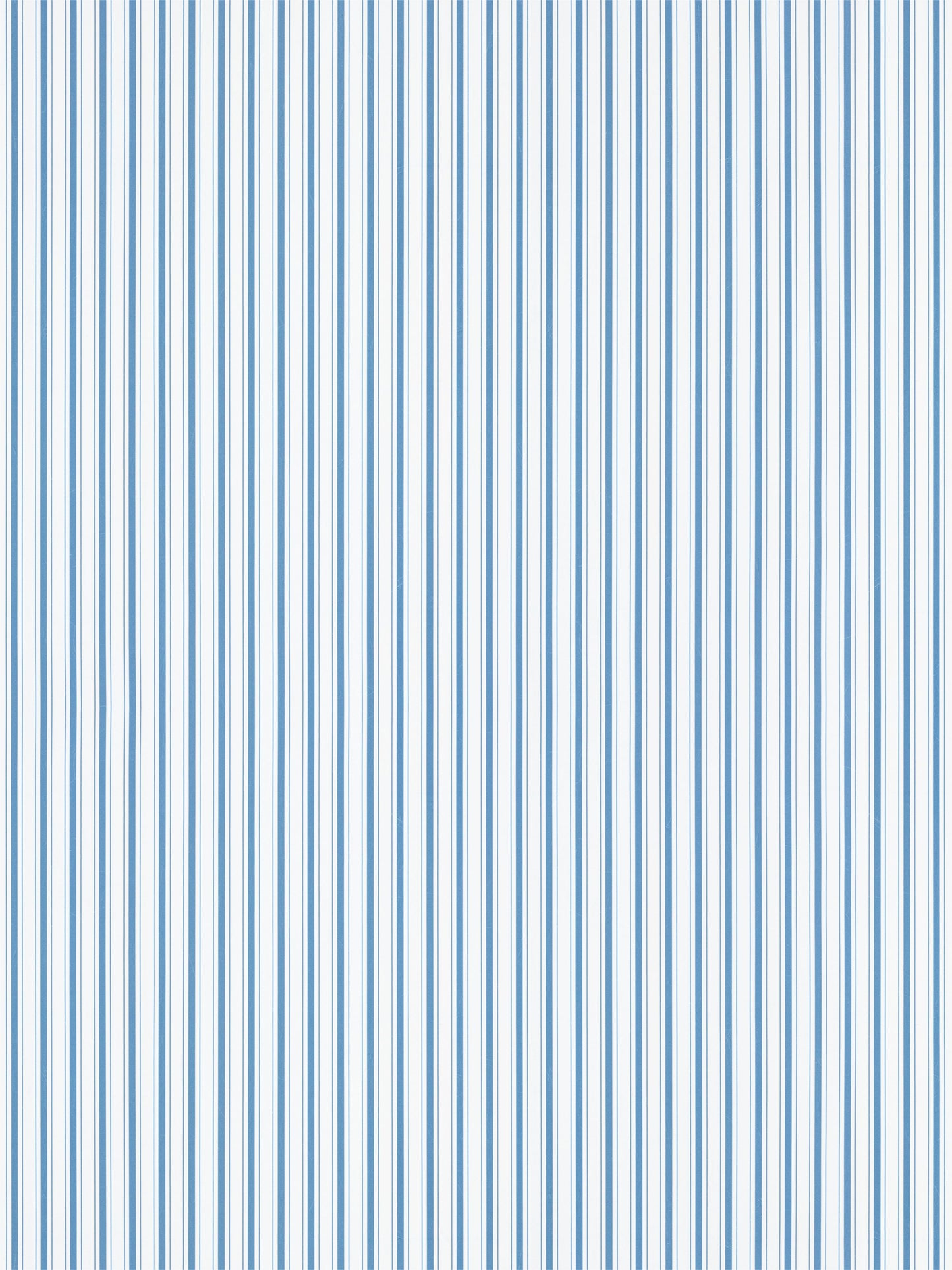 Blue and white vertical striped wallpaper with thin, evenly spaced stripes in a nautical pattern.