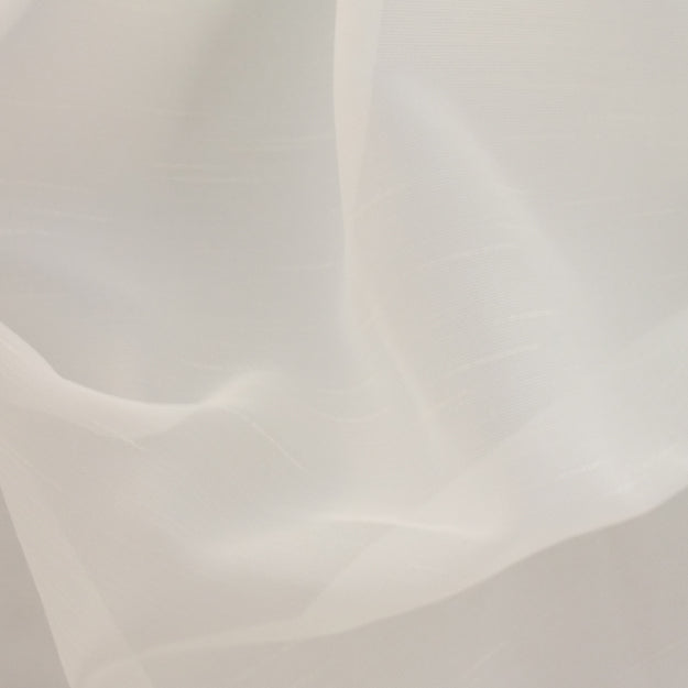 Plain creme/off-white woven fabric with soft drape; lightweight and double width.