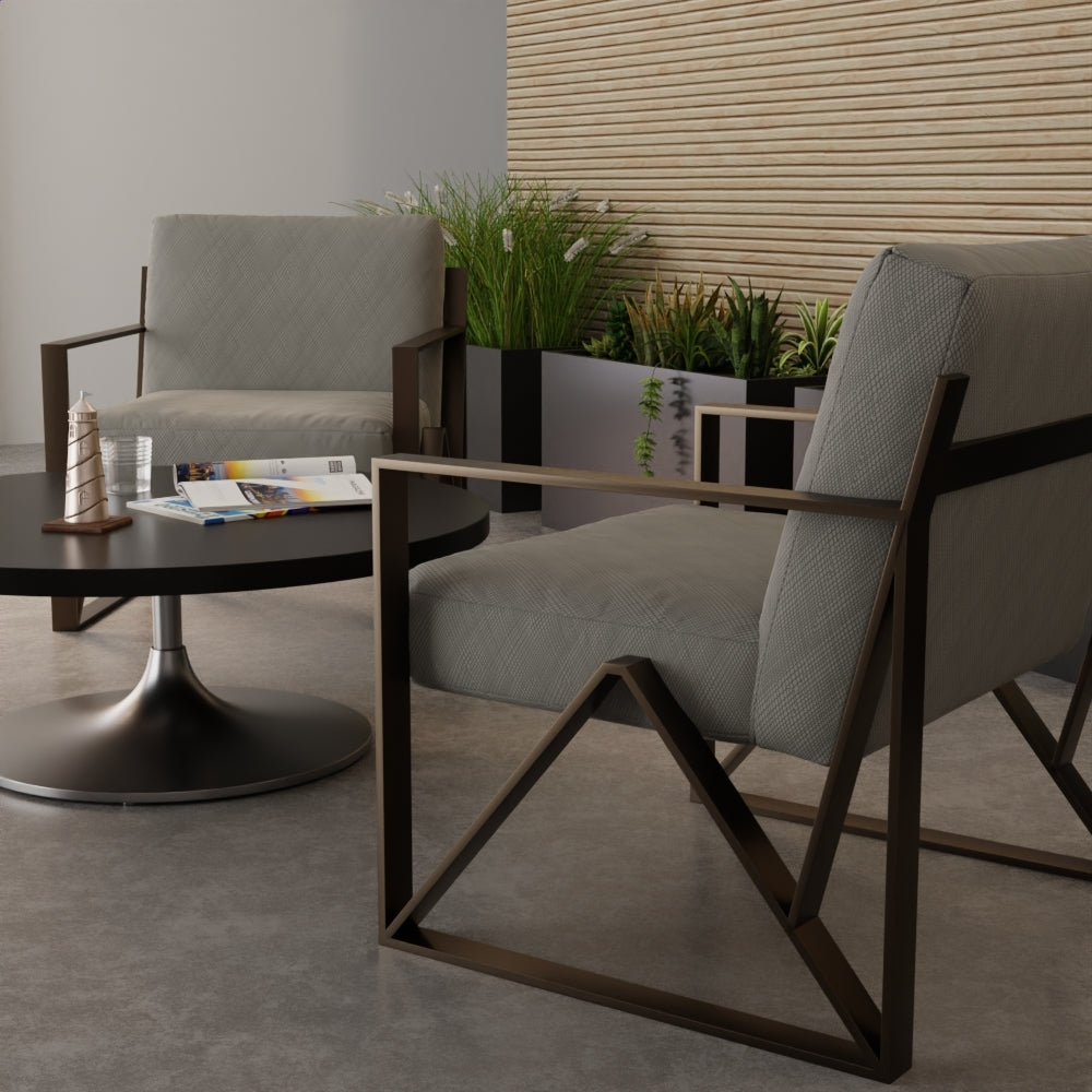Gray fabric on contemporary upholstered seating in a modern lounge with a round coffee table, magazines, plants, and a wood slat wall.