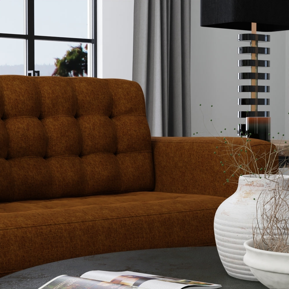 Warm sepia solid fabric in a contemporary living room scene with a white ceramic vase and a stacked-ring floor lamp.