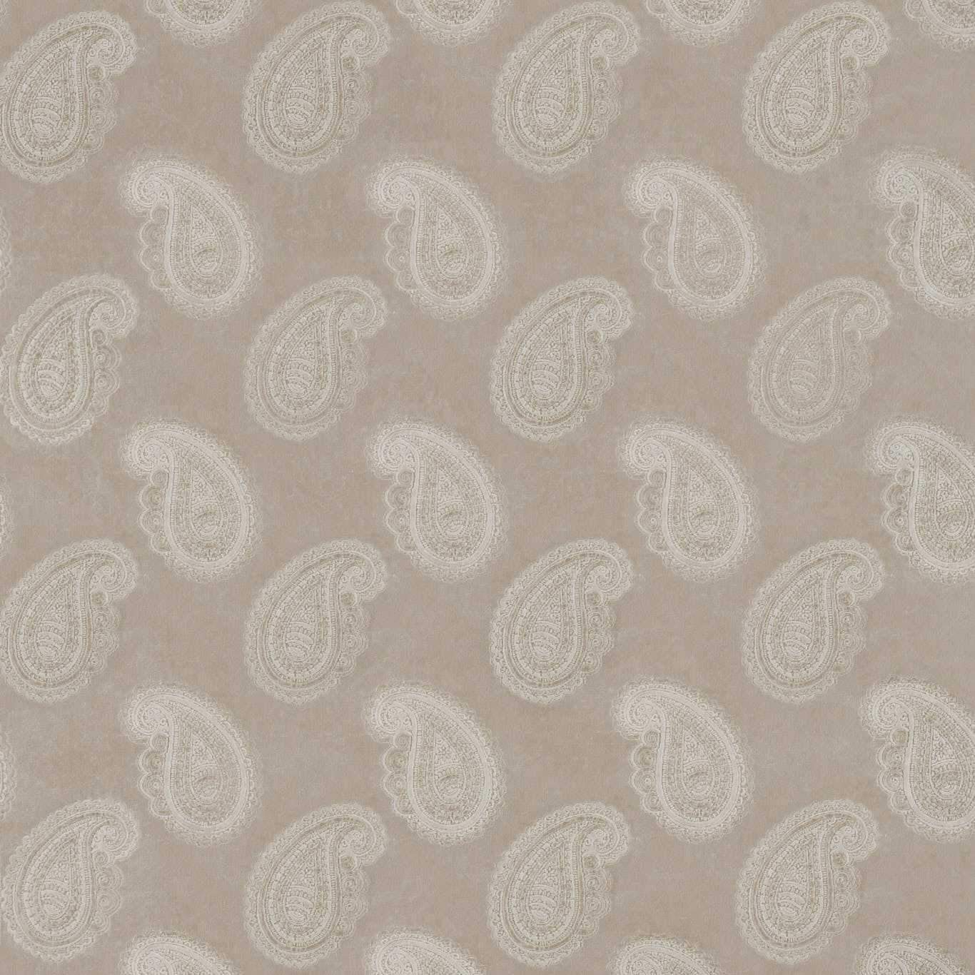 Beige velvet fabric with a repeating white paisley motif, vintage-inspired pattern.