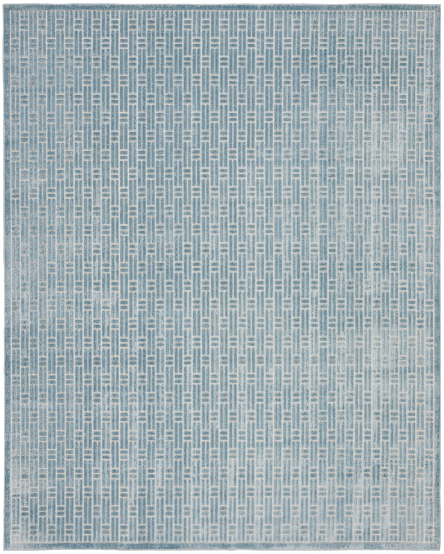 Blue-gray rectangular rug with a subtle woven lattice pattern and pale border.