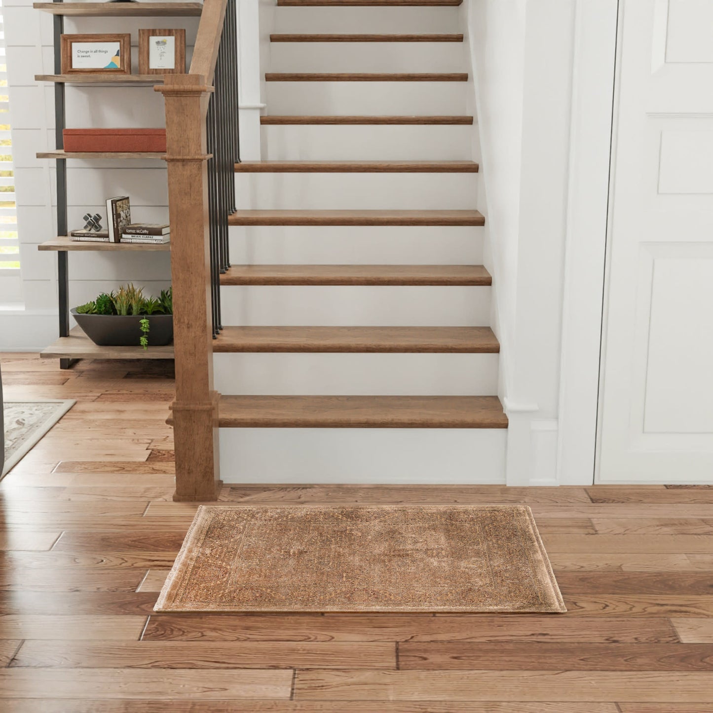 Brown woven rug on oak flooring.