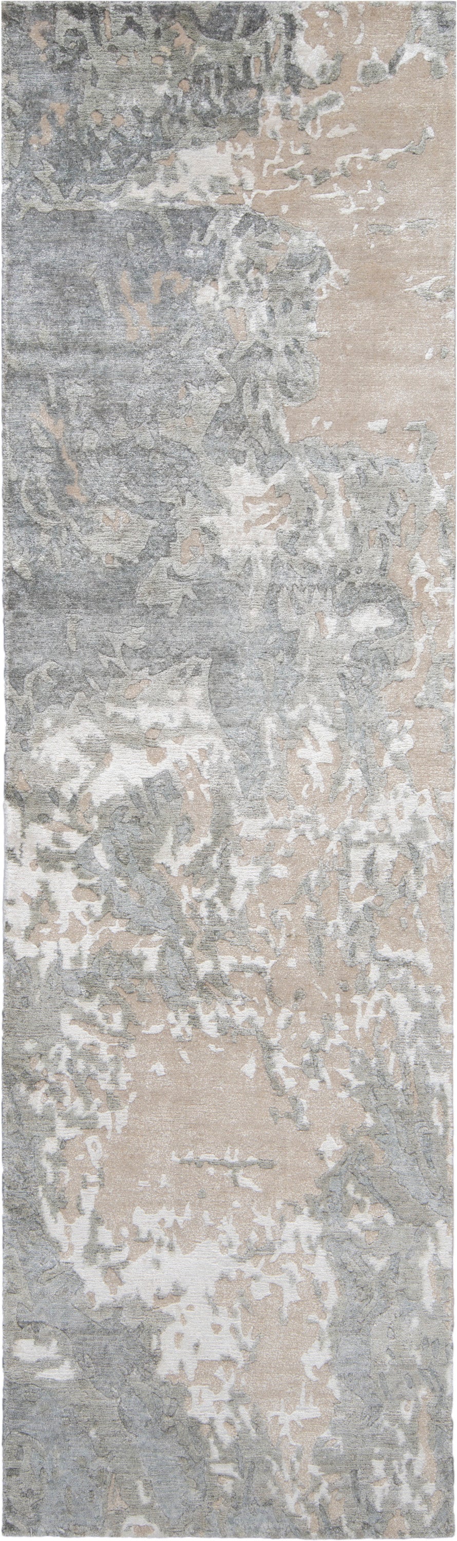 Abstract distressed runner rug in gray, beige and ivory with a marbled, blotchy pattern.