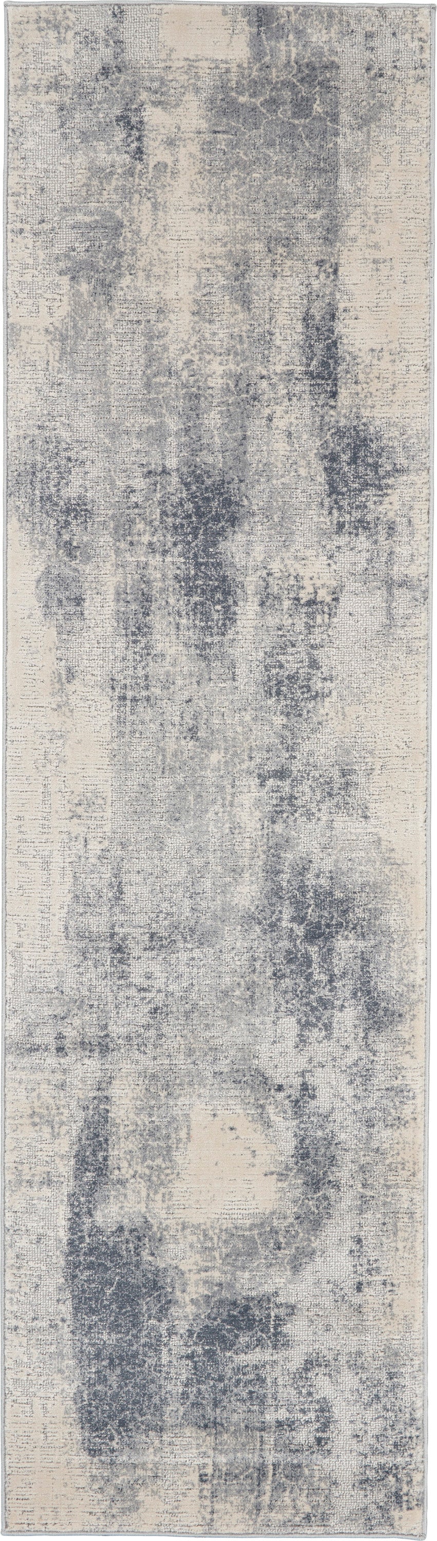 Long runner rug with distressed blue-gray and beige abstract pattern, soft pile, modern vintage look.